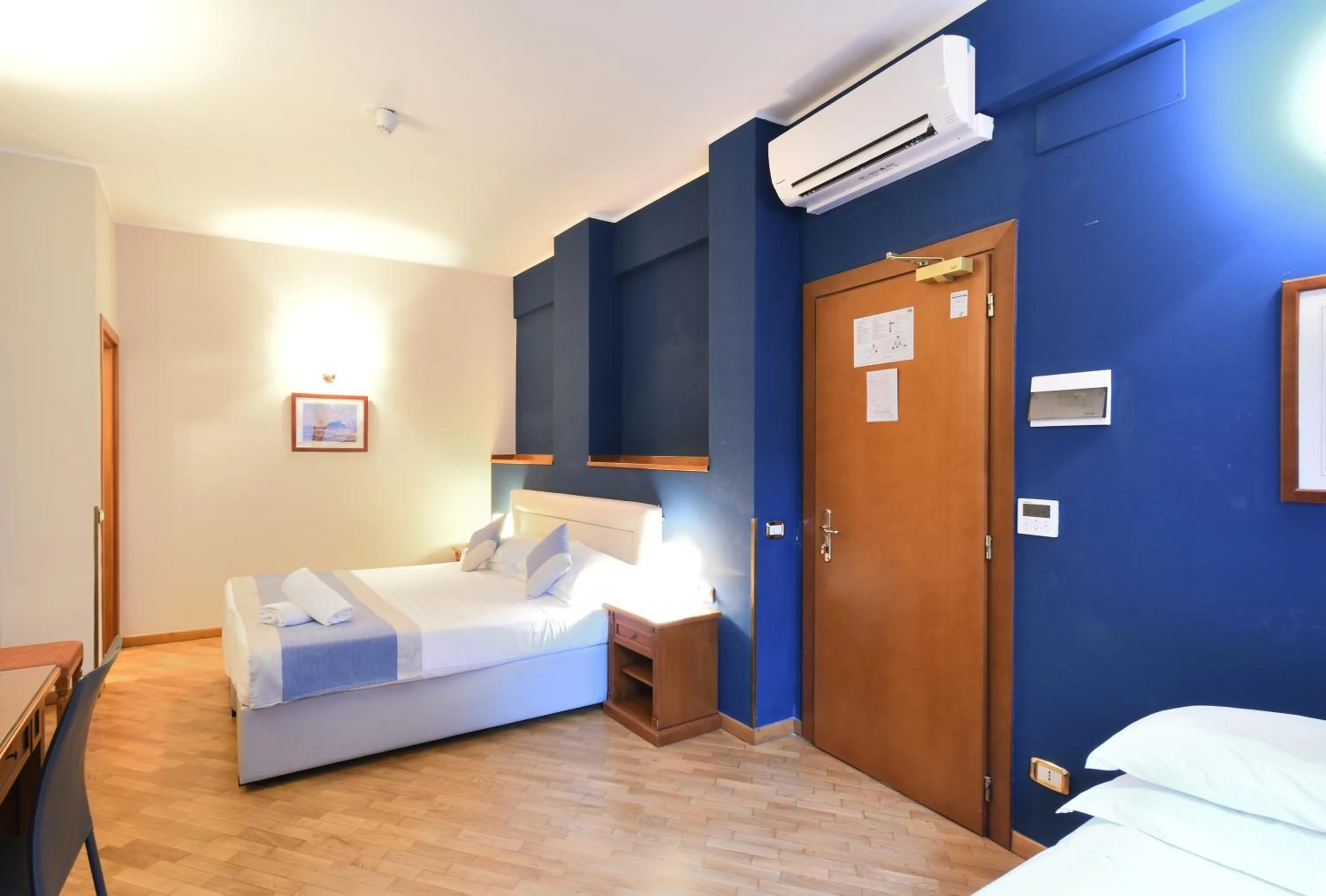 Bed in Hotel Cavour