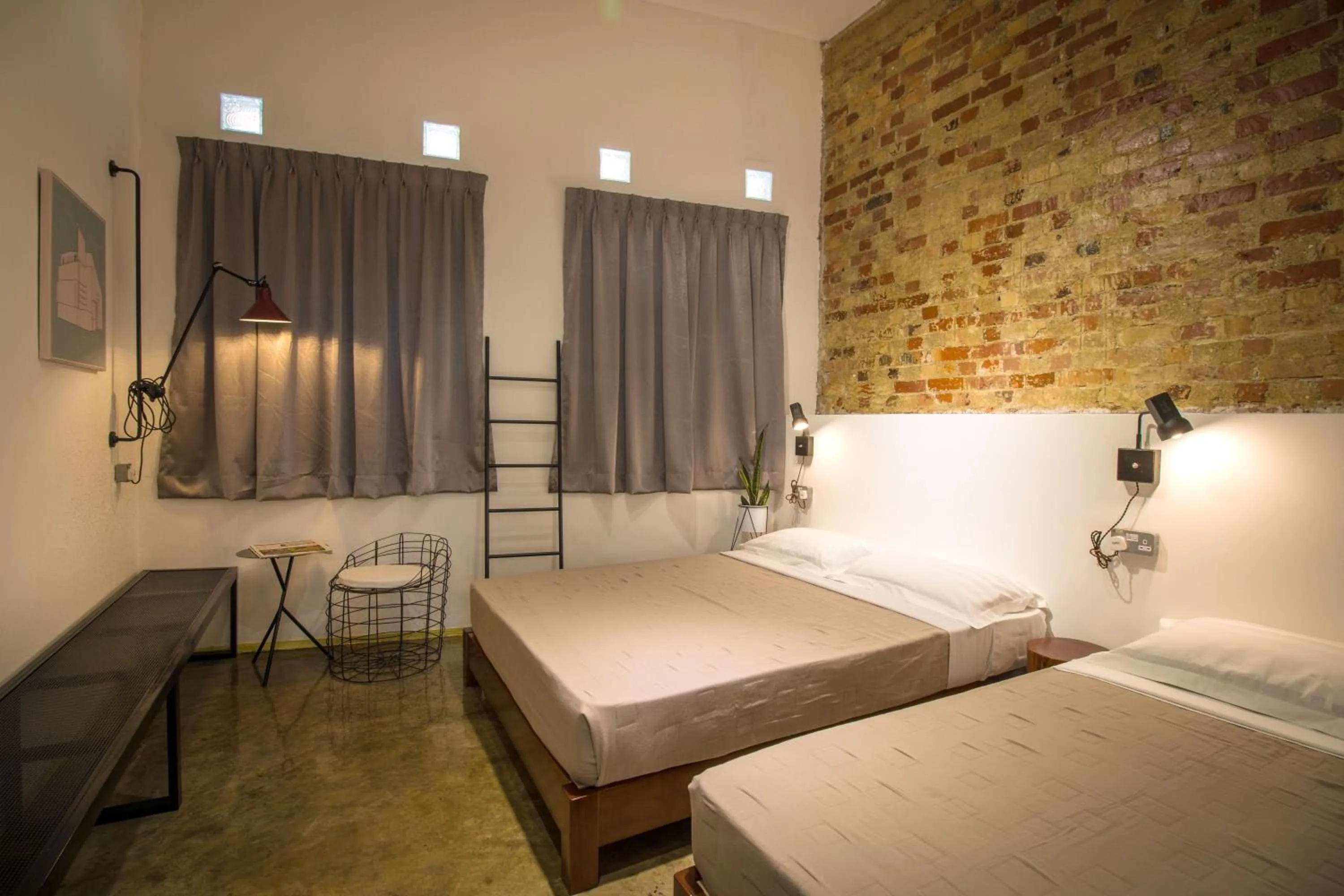 Triple Room with Shared Bathroom in The Brownstone Hostel & Space