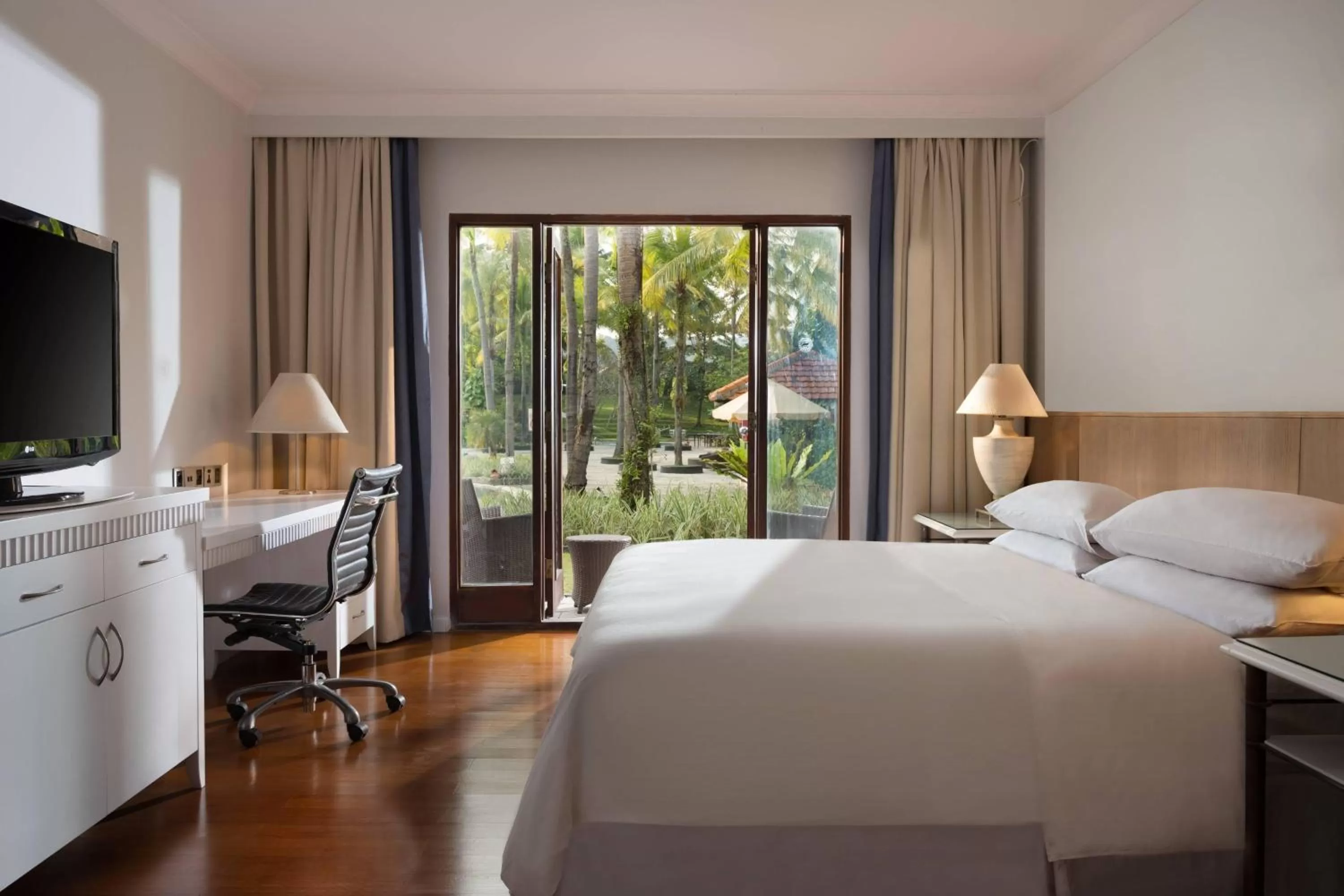 Deluxe King Room with Terrace and Garden Access - Non-Smoking in AKAR Hotels & Resort Lampung