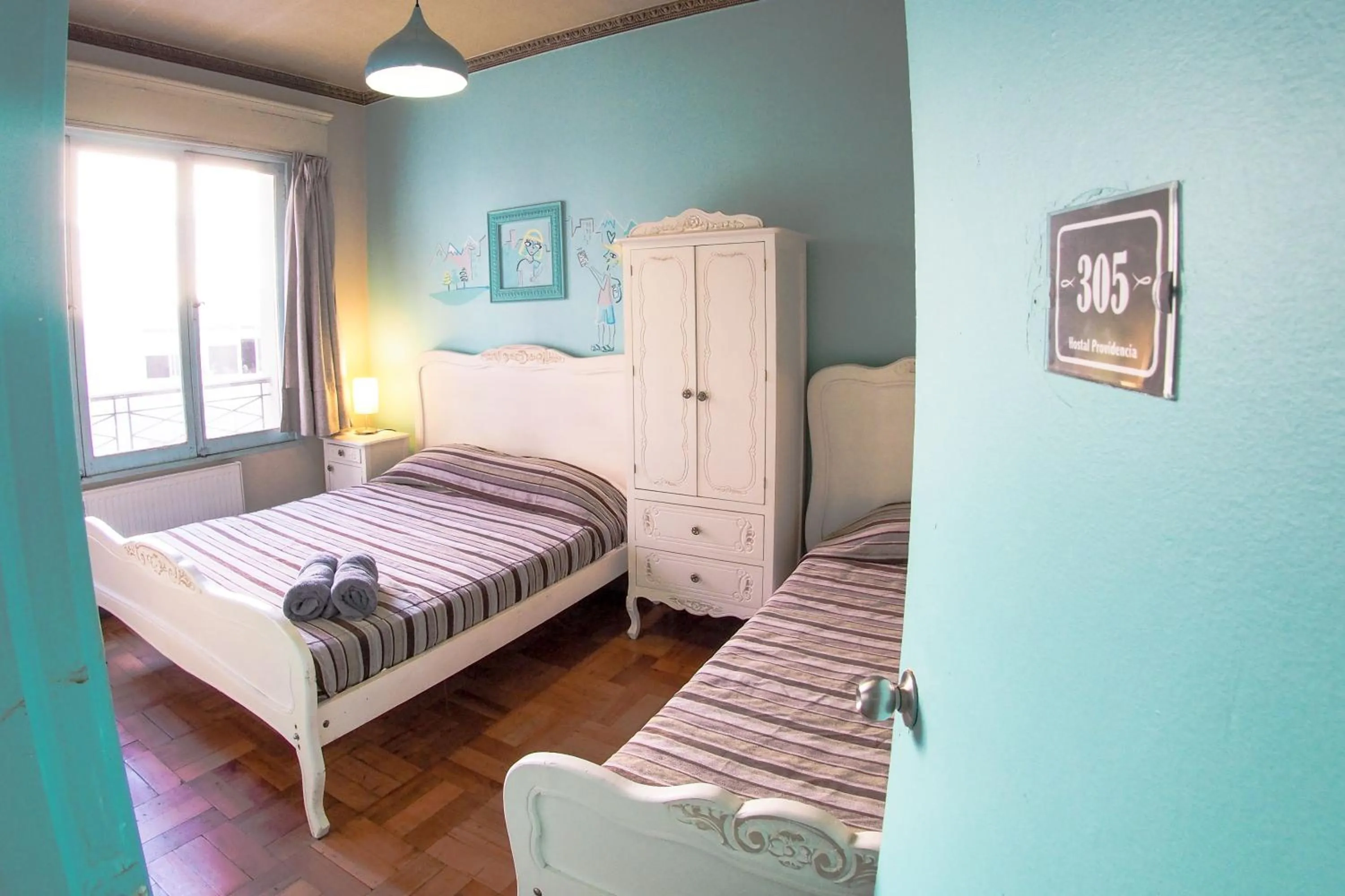 Triple Room with Private Bathroom in Hostal Providencia