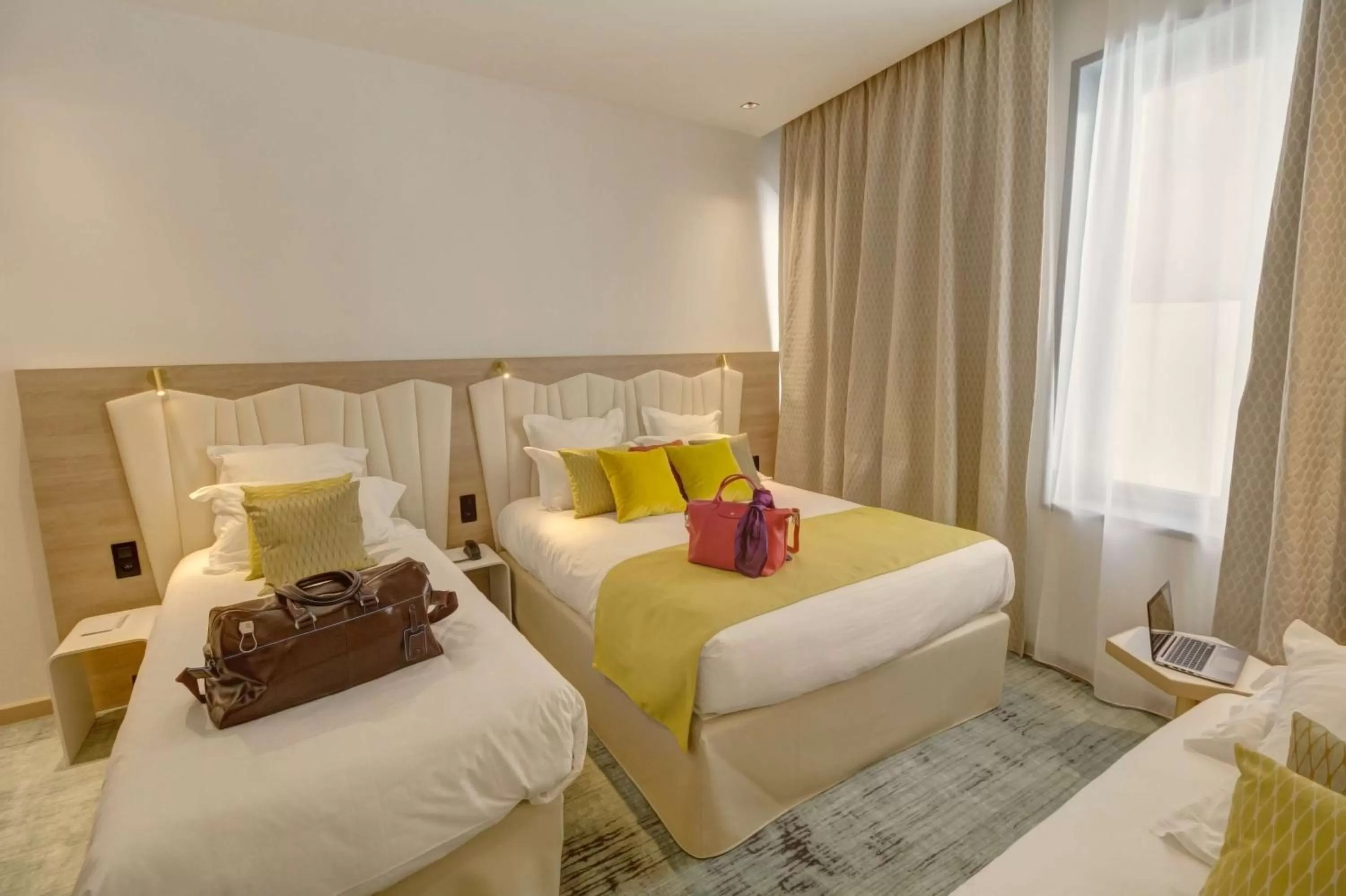 Family Quadruple Room in Best Western Plus Comedie Saint Roch