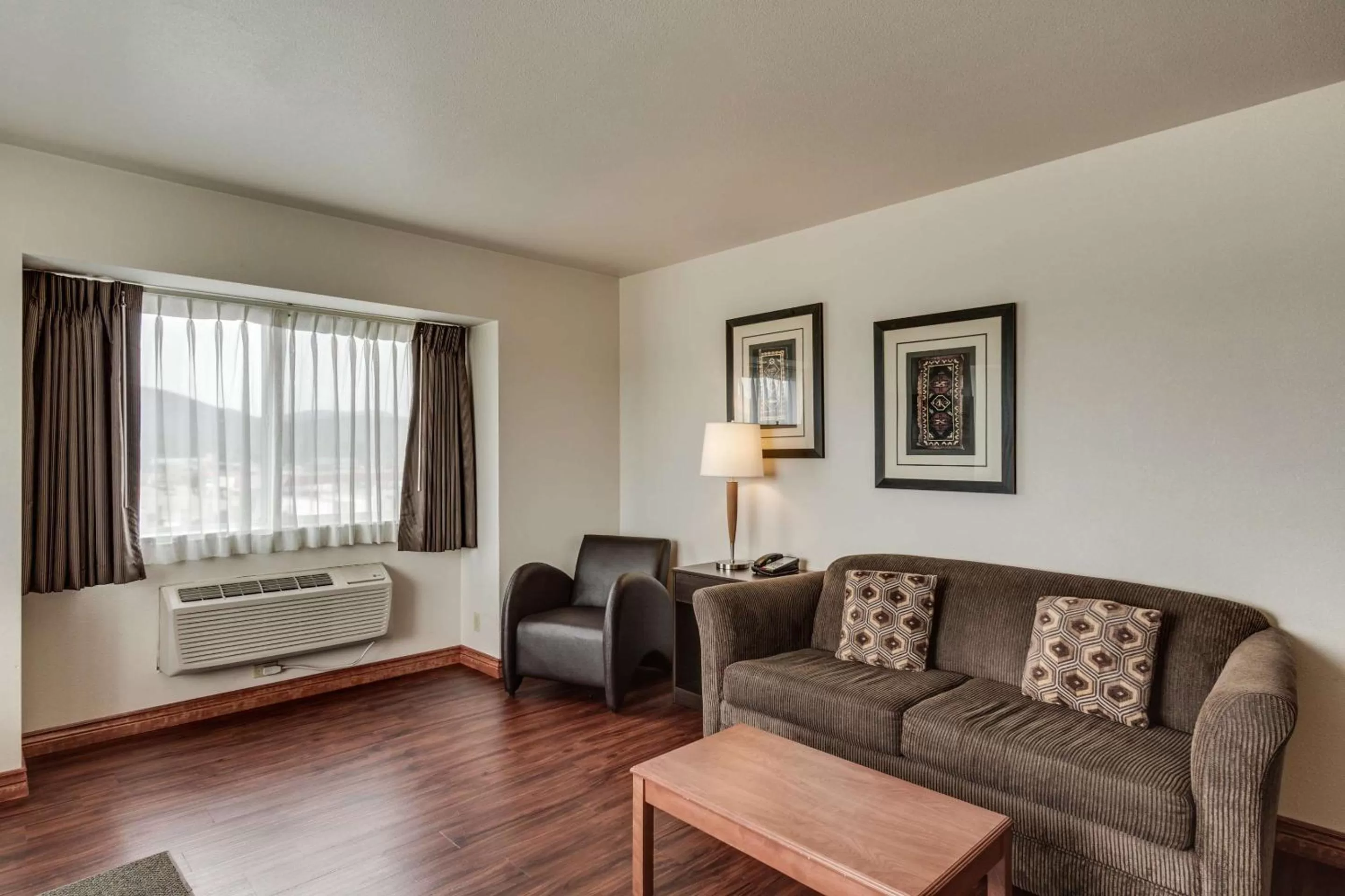King Suite with with Sofa Bed and Mountain View- Disability Access in SureStay Plus Hotel by Best Western Post Falls