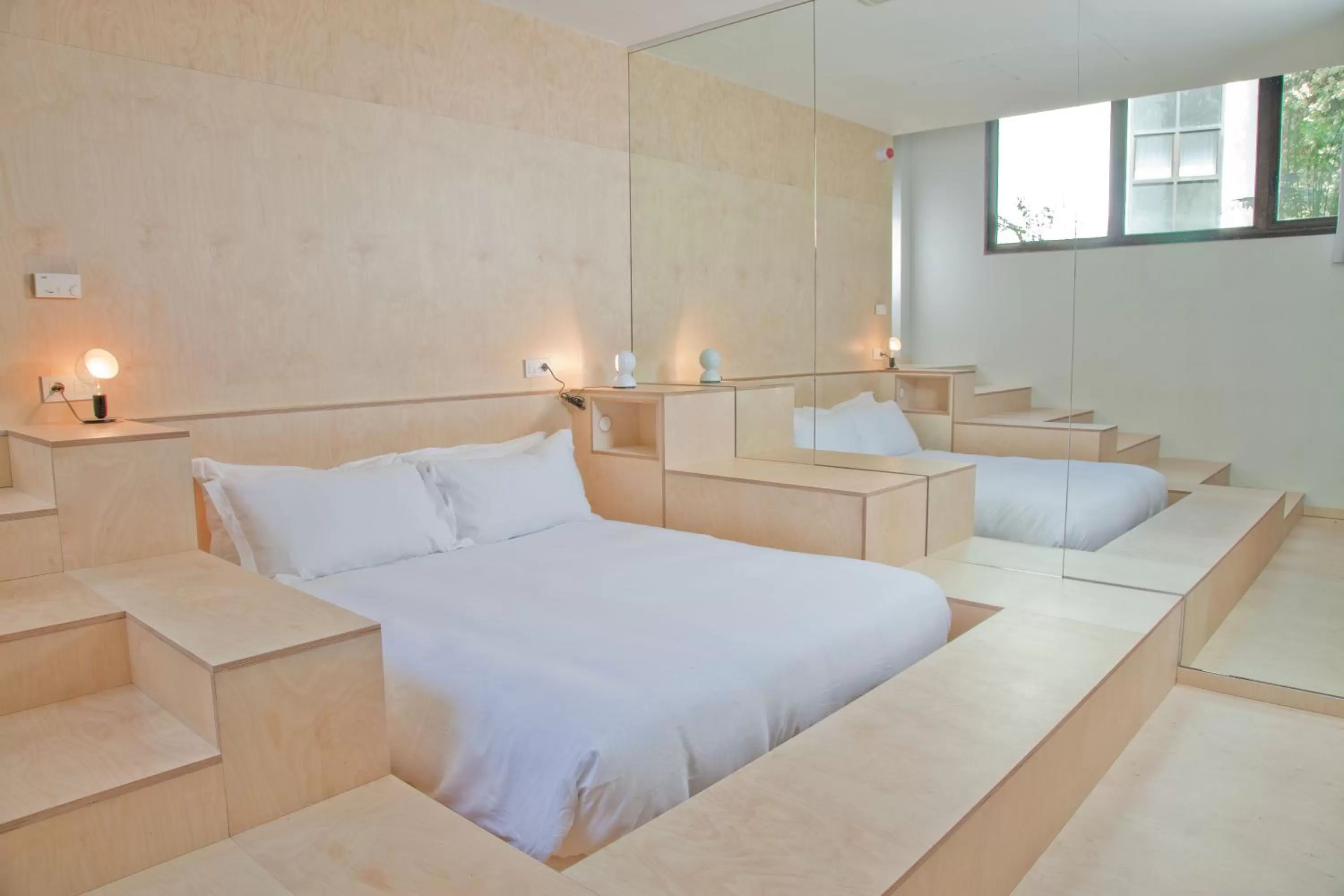 Bed in La Maison Champs Elysées