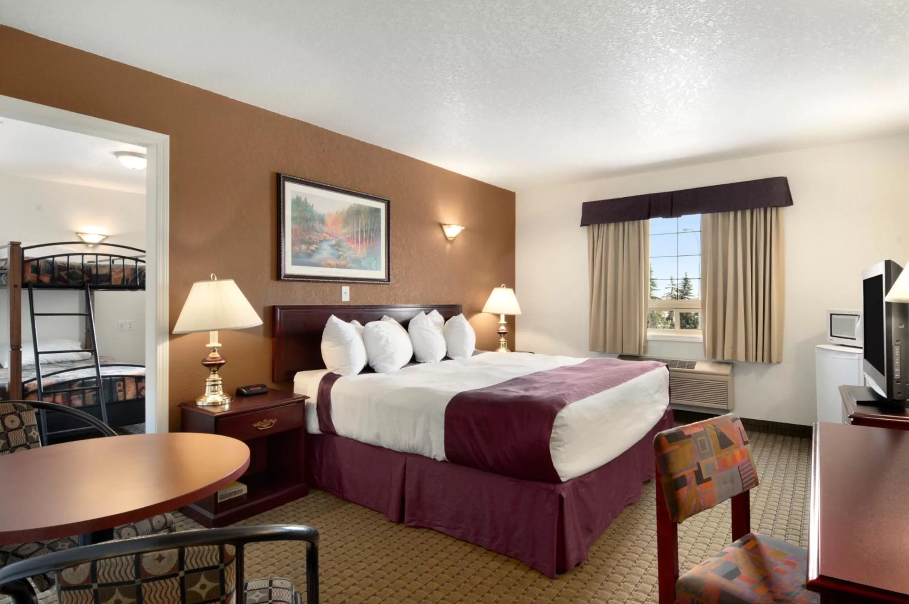 One-Bedroom King Suite with Bunk Bed - Non-Smoking in Ramada by Wyndham Red Deer Hotel & Suites