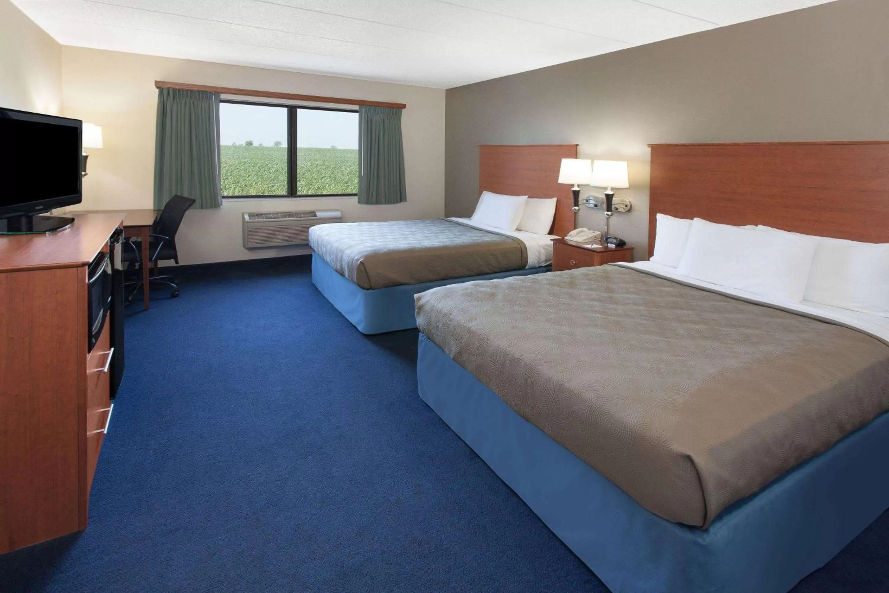 Queen Room with Two Queen Beds - Non-Smoking in AmericInn by Wyndham Webster City
