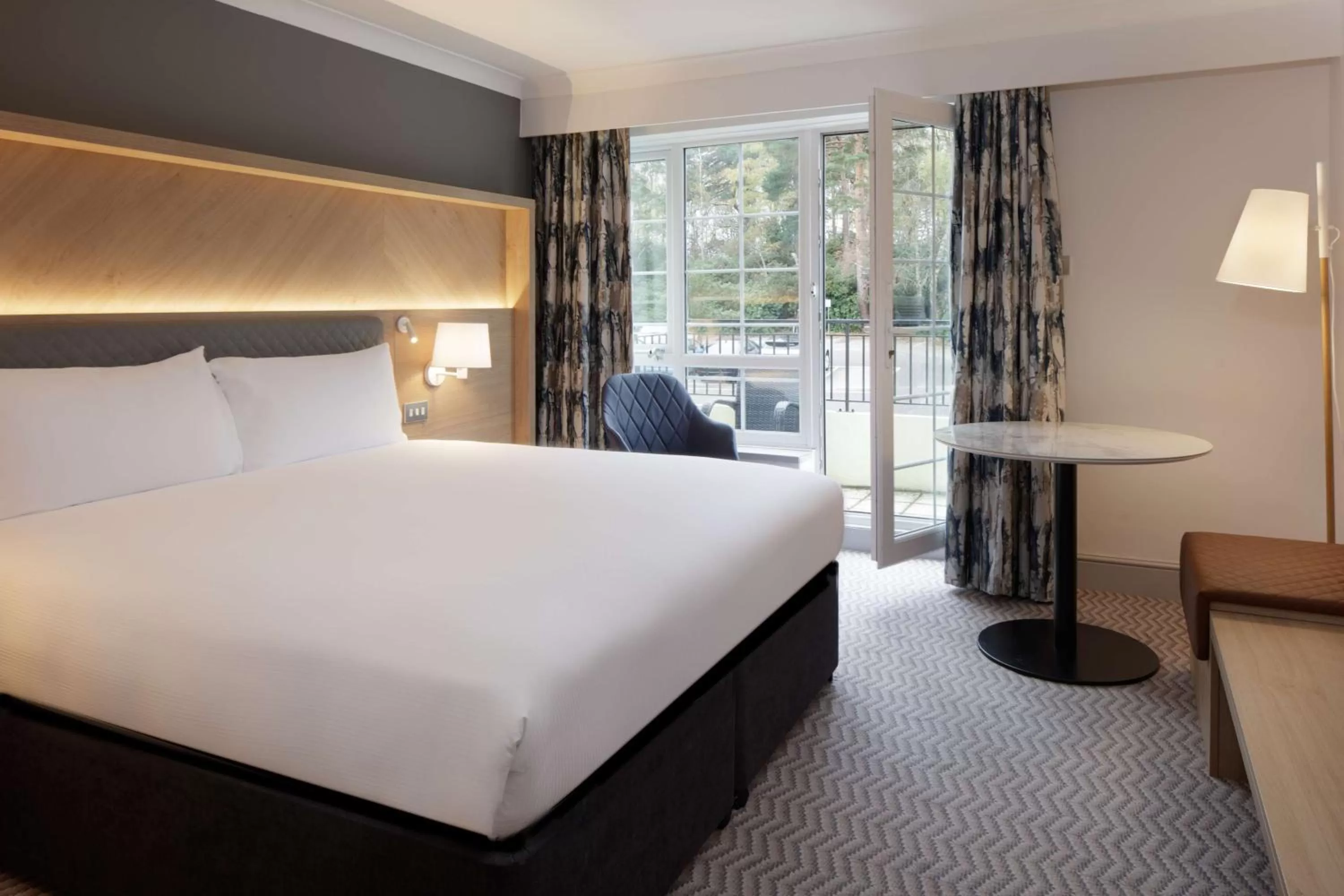 King Room with Balcony and Garden Views in Hilton Cobham