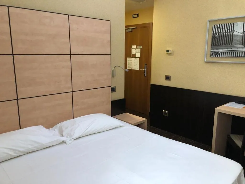 Bed in Hotel Cimarosa