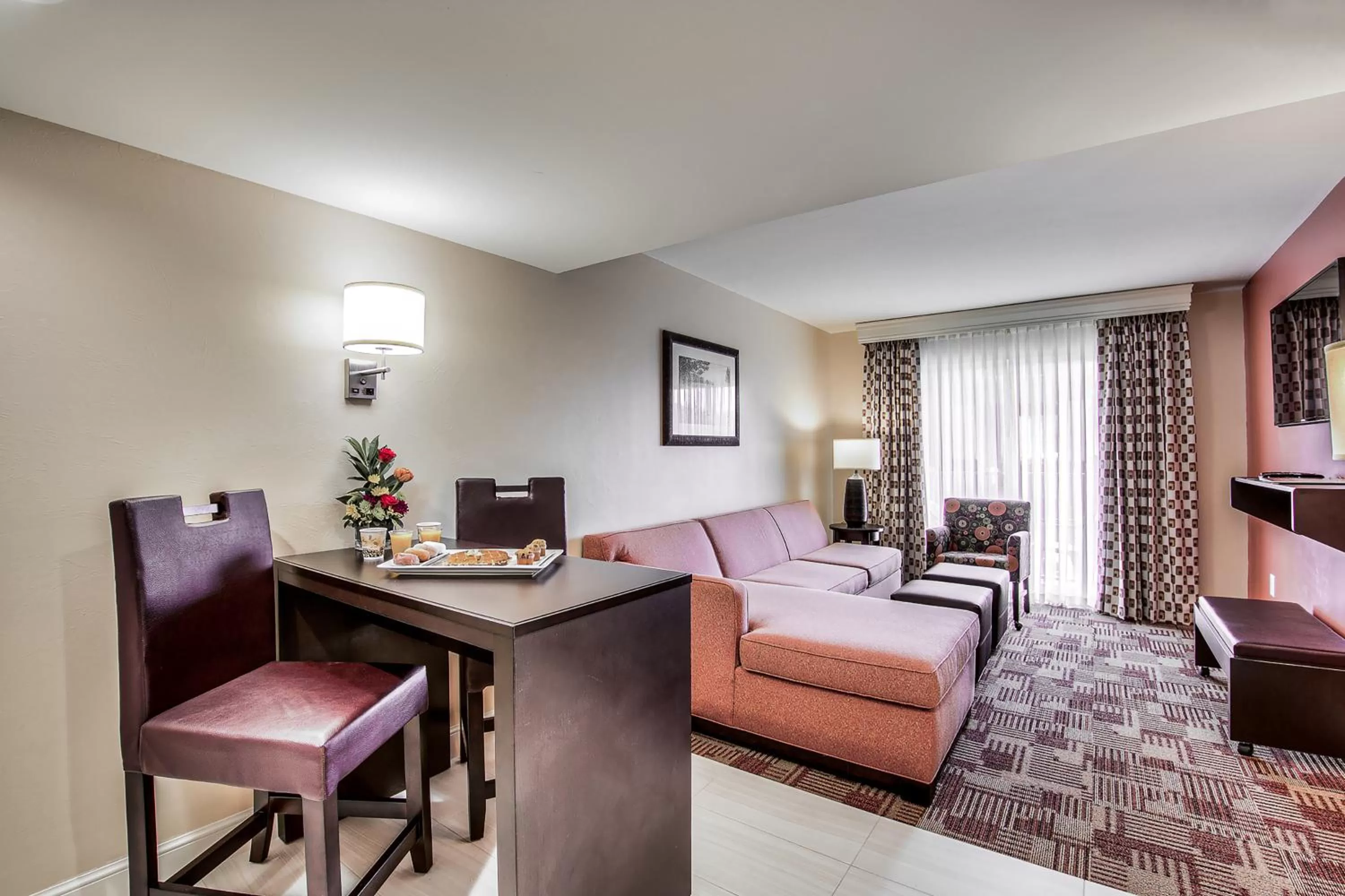 One-Bedroom King Suite with Sofa Bed and Balcony in Inn of Naples, Tapestry Collection by Hilton