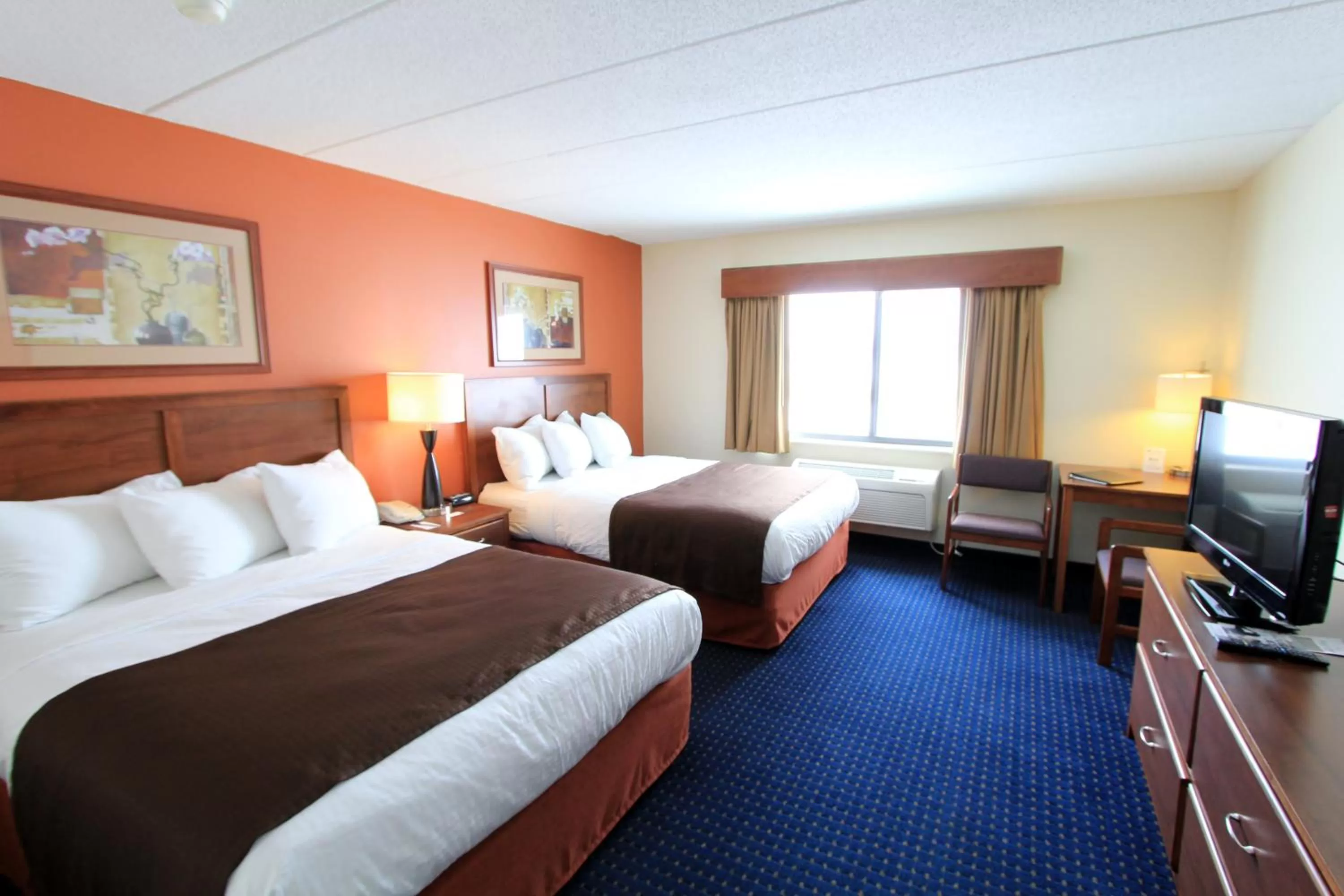 Queen Room with Two Queen Beds - Non-Smoking in AmericInn by Wyndham Cedar Rapids Airport