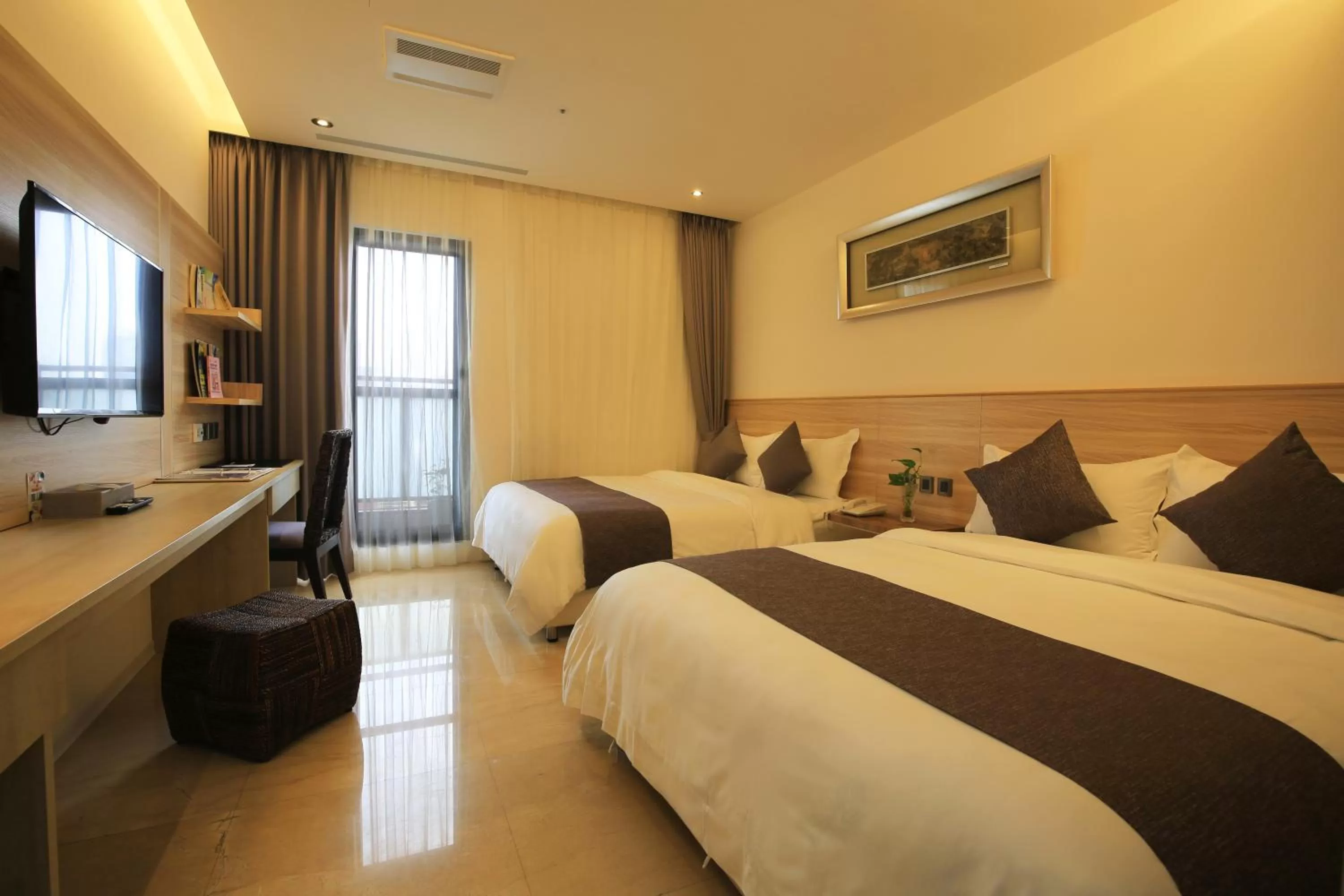 Quadruple Room with Balcony in Darlon Hotel