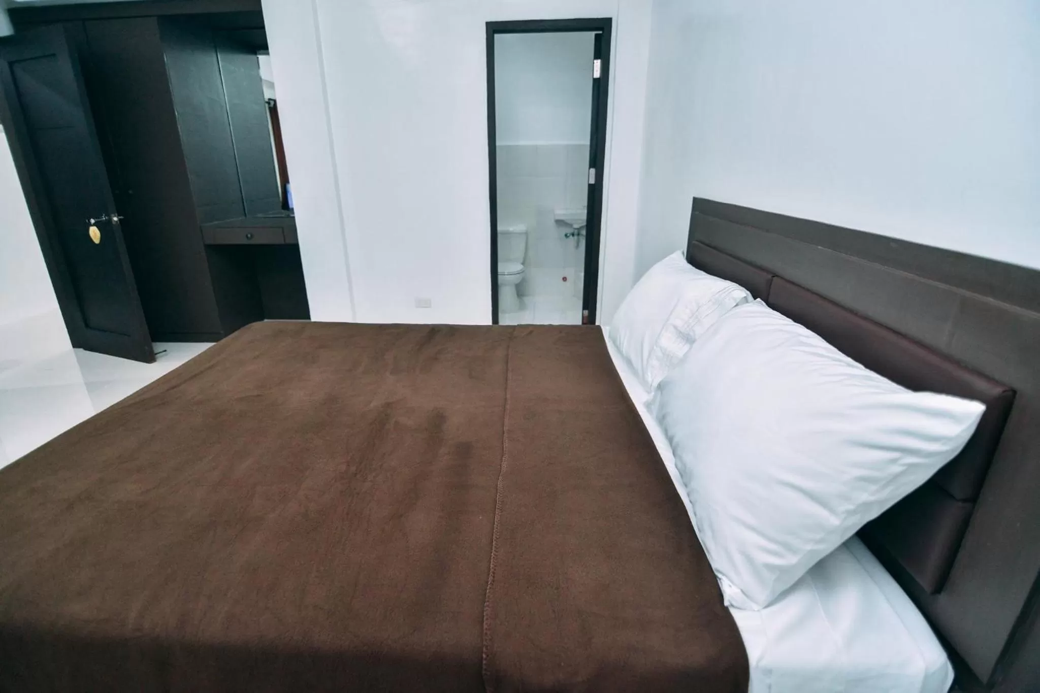 Studio Queen in The Strand Suites and Dormitel