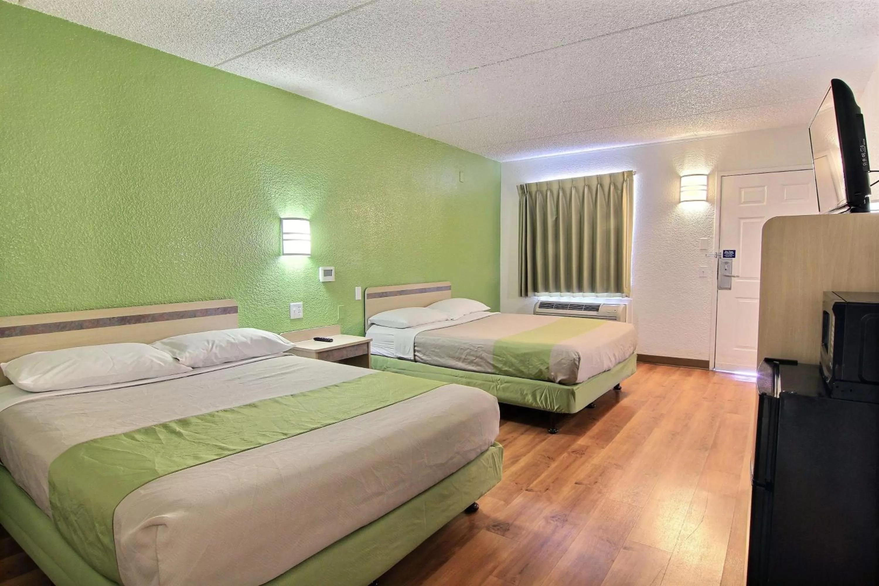 Queen Room with Two Queen Beds - single occupancy in Motel 6 Austin, TX - Central Downtown UT