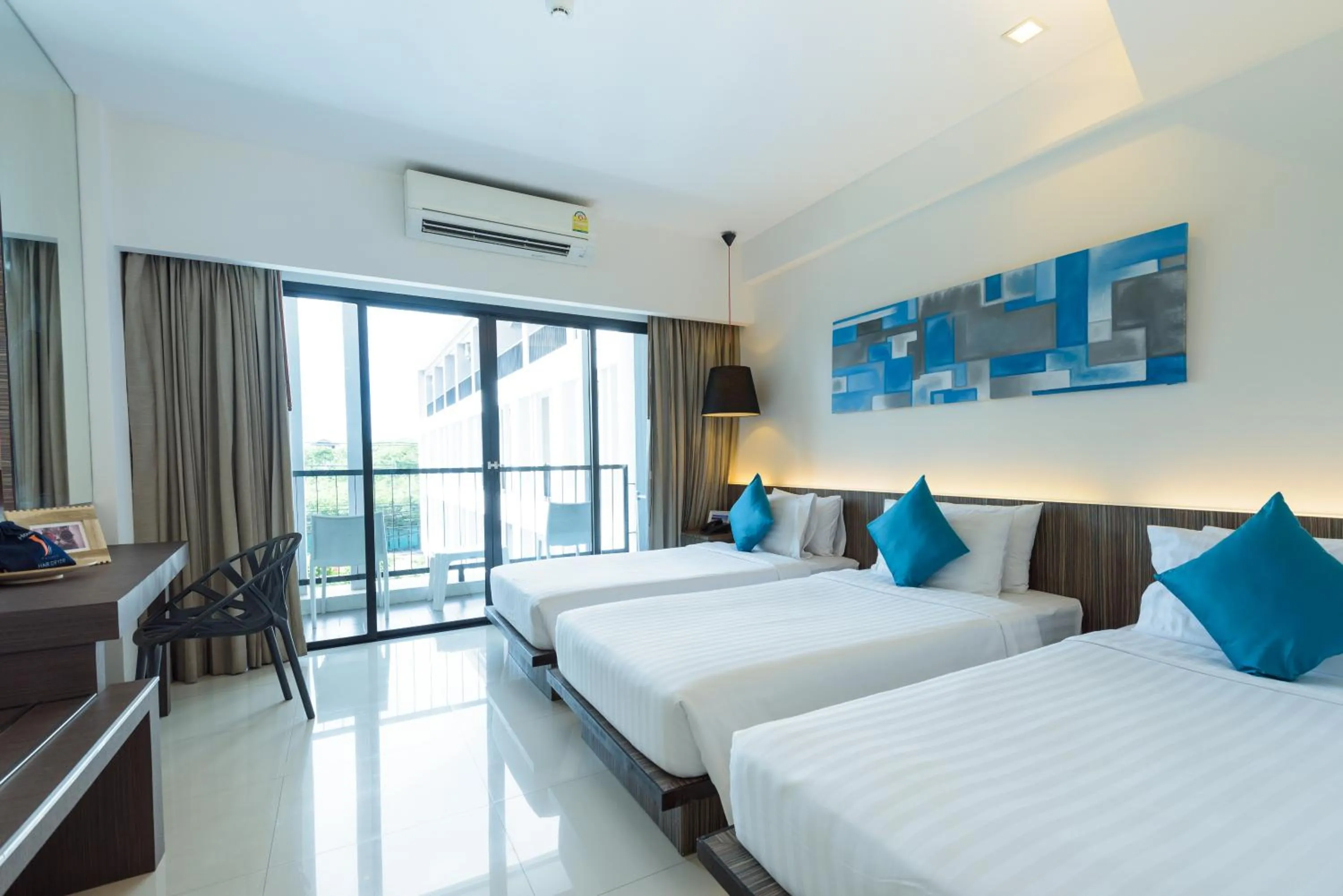 Deluxe Triple Room in Hotel J Residence Pattaya