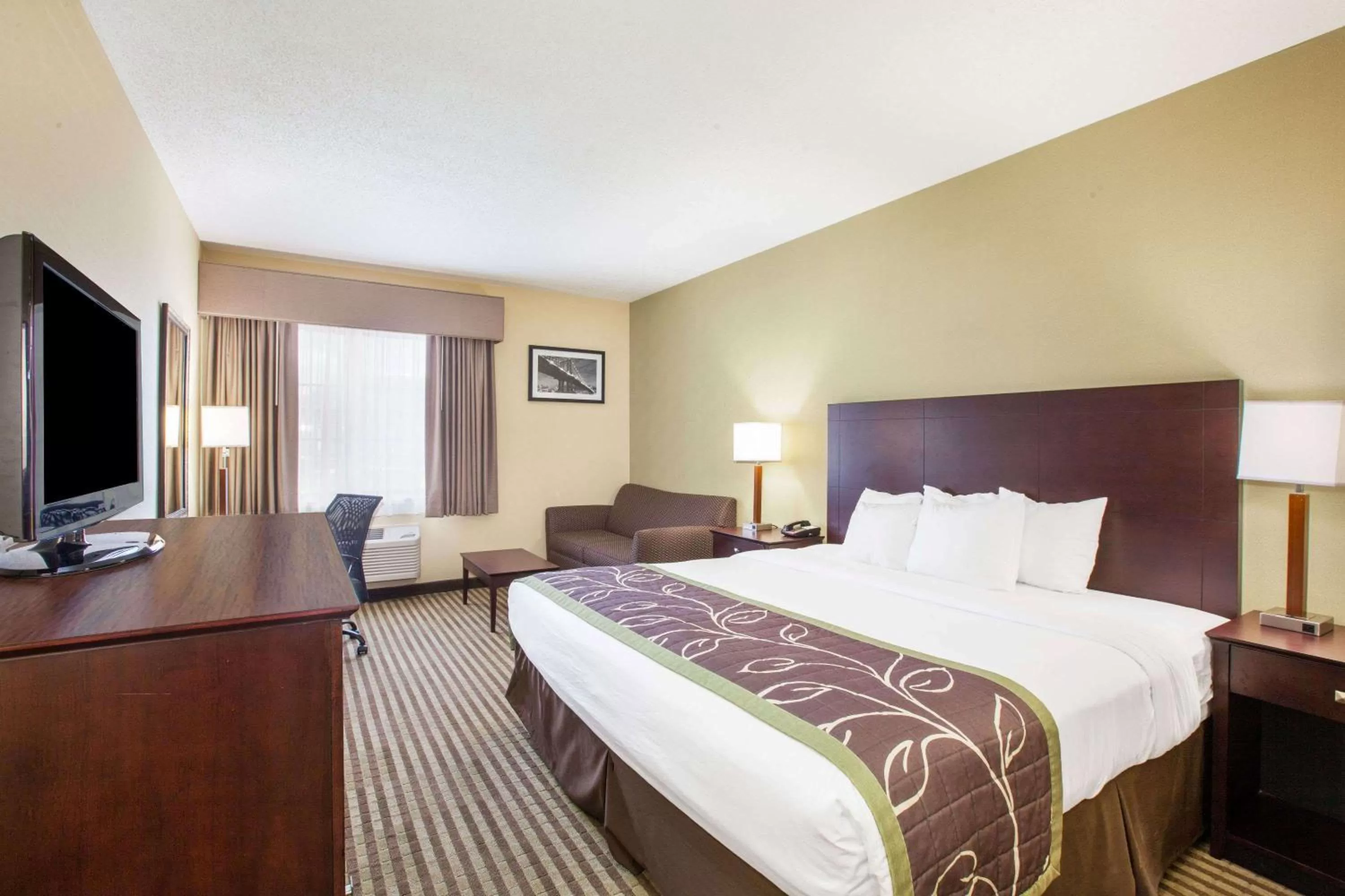 Deluxe King Room - Non-Smoking in Days Inn by Wyndham Brewerton/ Syracuse near Oneida Lake