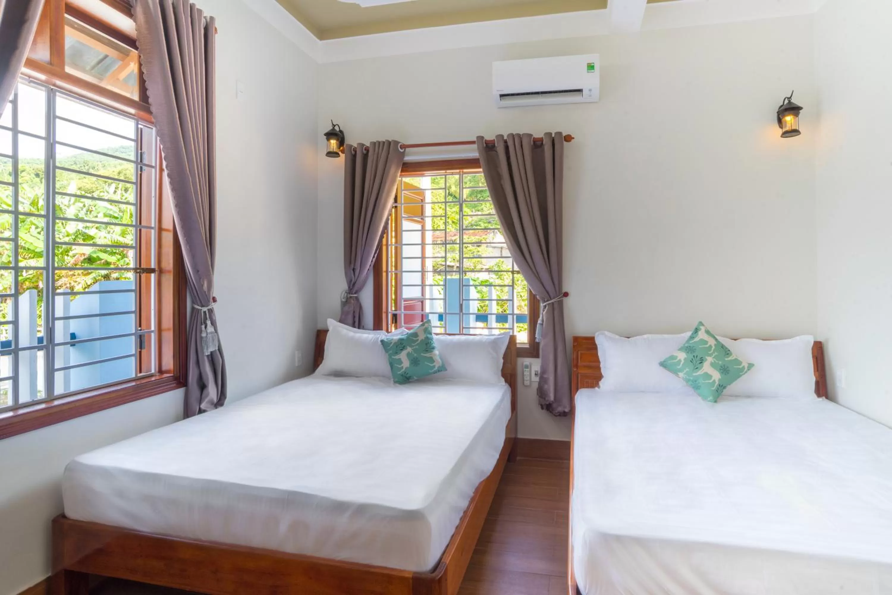 Quadruple Room with Mountain View in Cong Man Homestay Cham Island