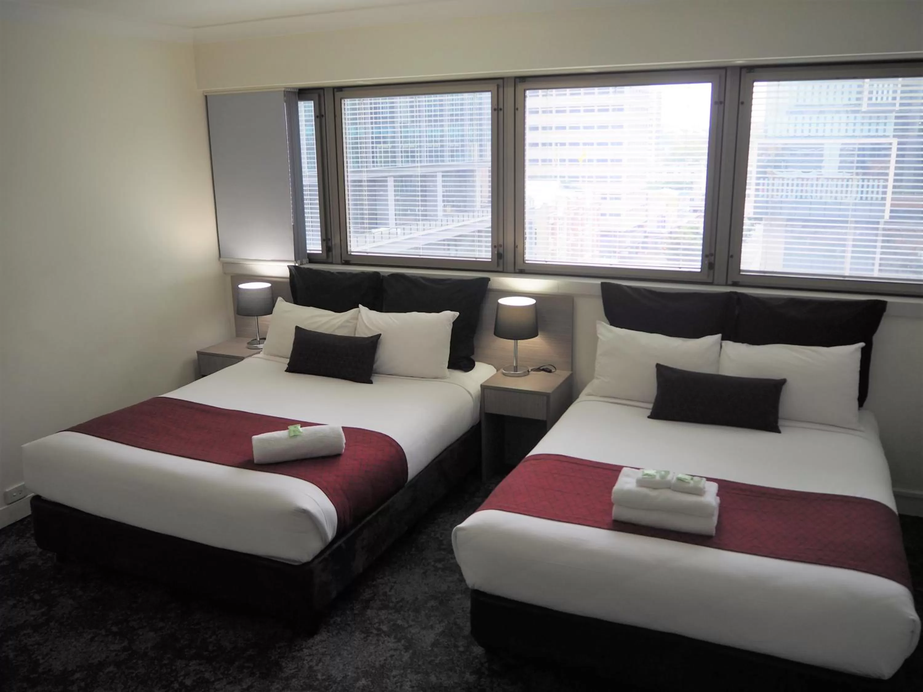 Queen Room with Queen Bed and Double Bed in George Williams Hotel