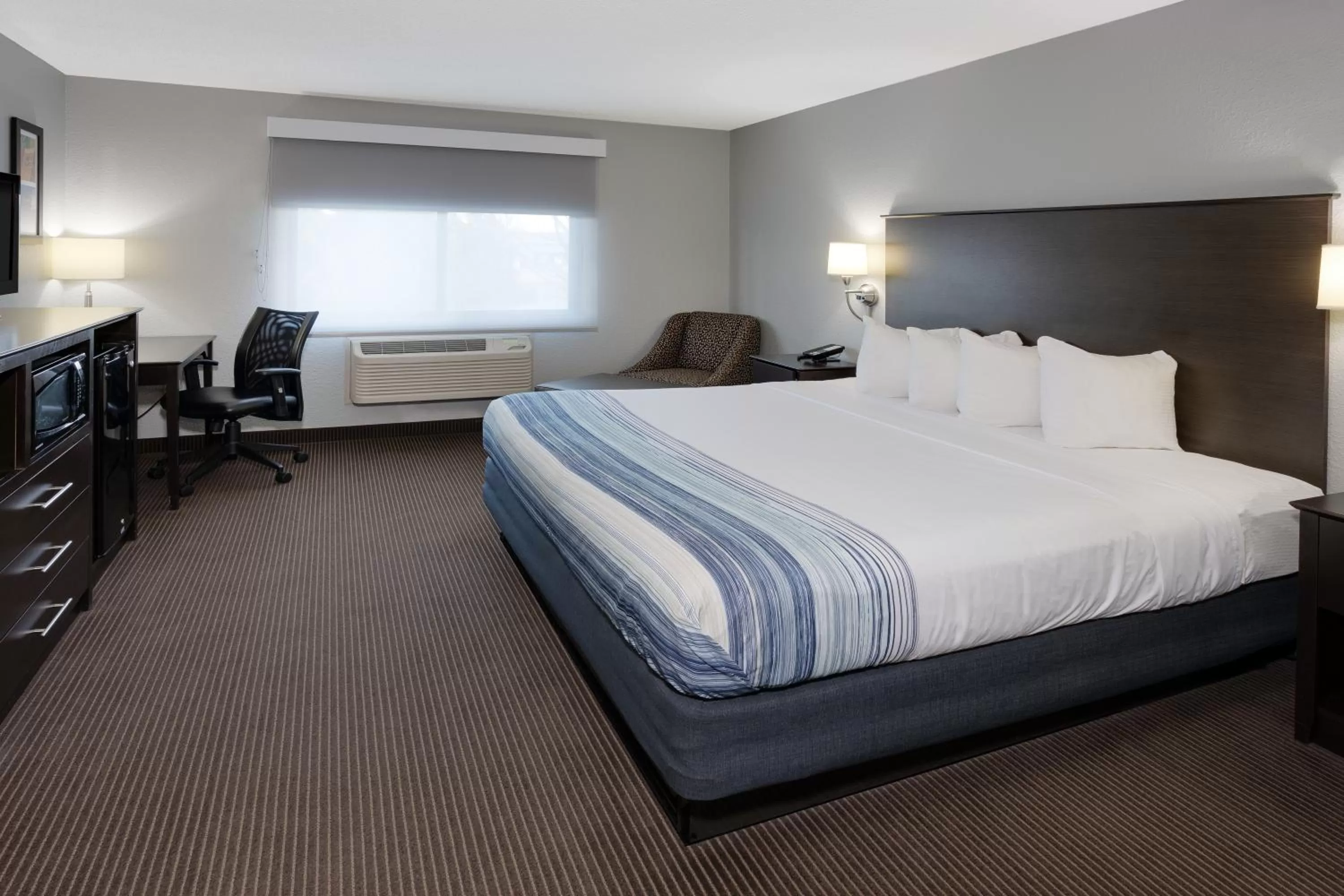 King Room - Mobility Access/Non-Smoking in AmericInn by Wyndham Plover Stevens Point