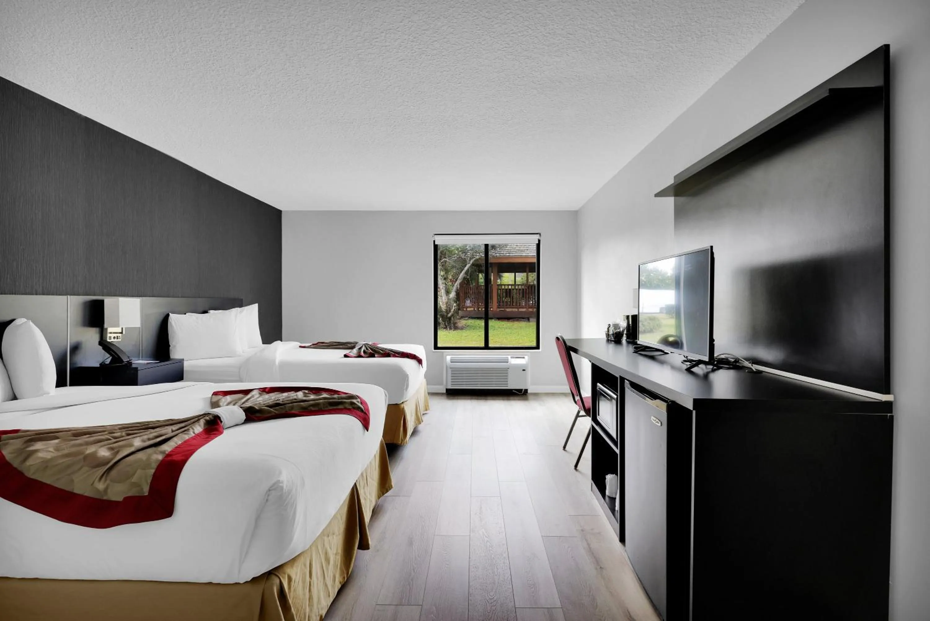 Deluxe Queen Room with Two Queen Beds - Mobility Access/Non-Smoking - Newly Renovated! in Ramada by Wyndham Jacksonville I-95 by Butler Blvd