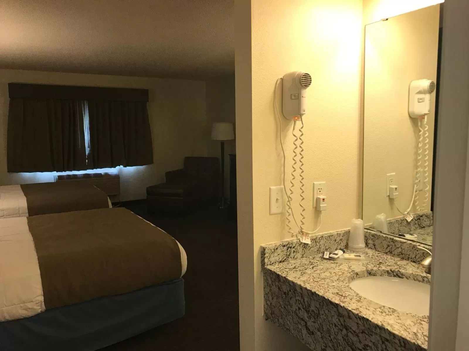 Queen Room with Two Queen Beds - Non-Smoking in AmericInn by Wyndham Hotel and Suites Long Lake