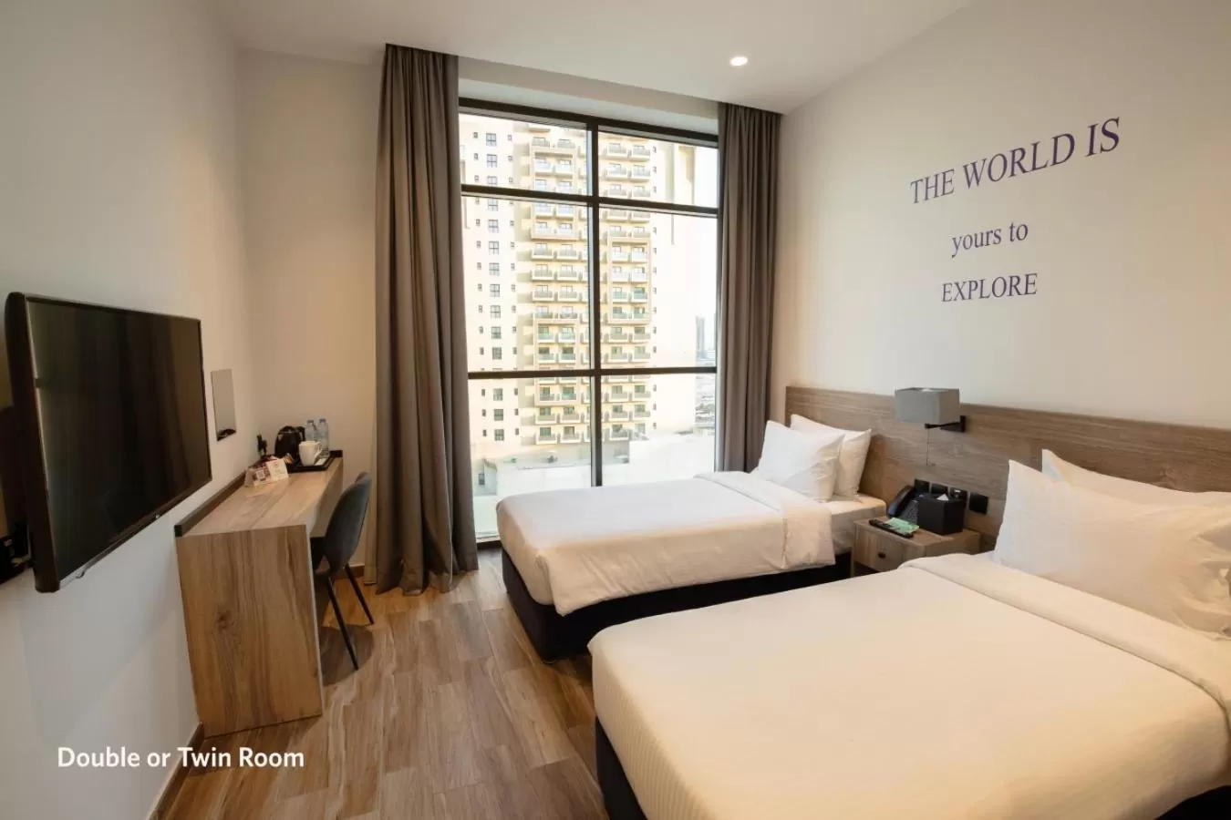 Deluxe Room Twin Bed with City View (includes 25% off F&B) in Kingsgate Al Jaddaf Hotel by Millennium