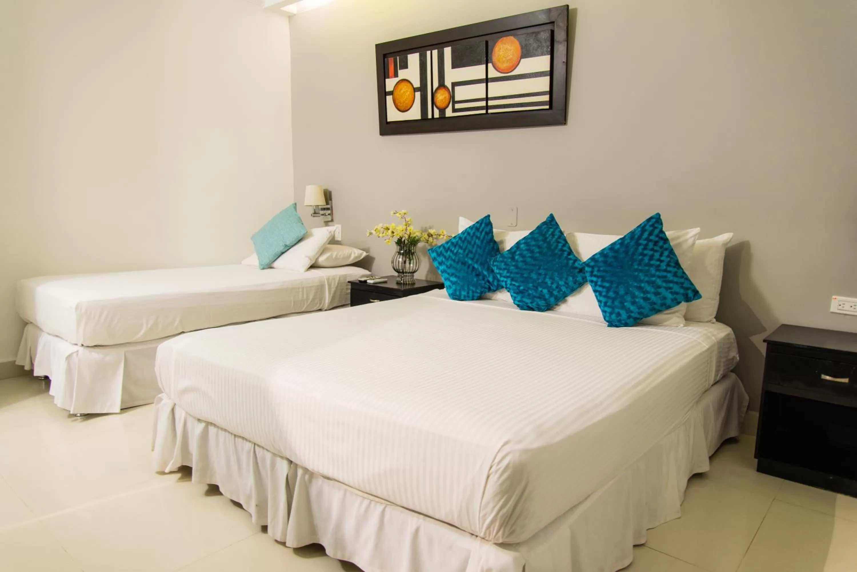 Quadruple Room in Hotel Bocagrande By GEH Suites