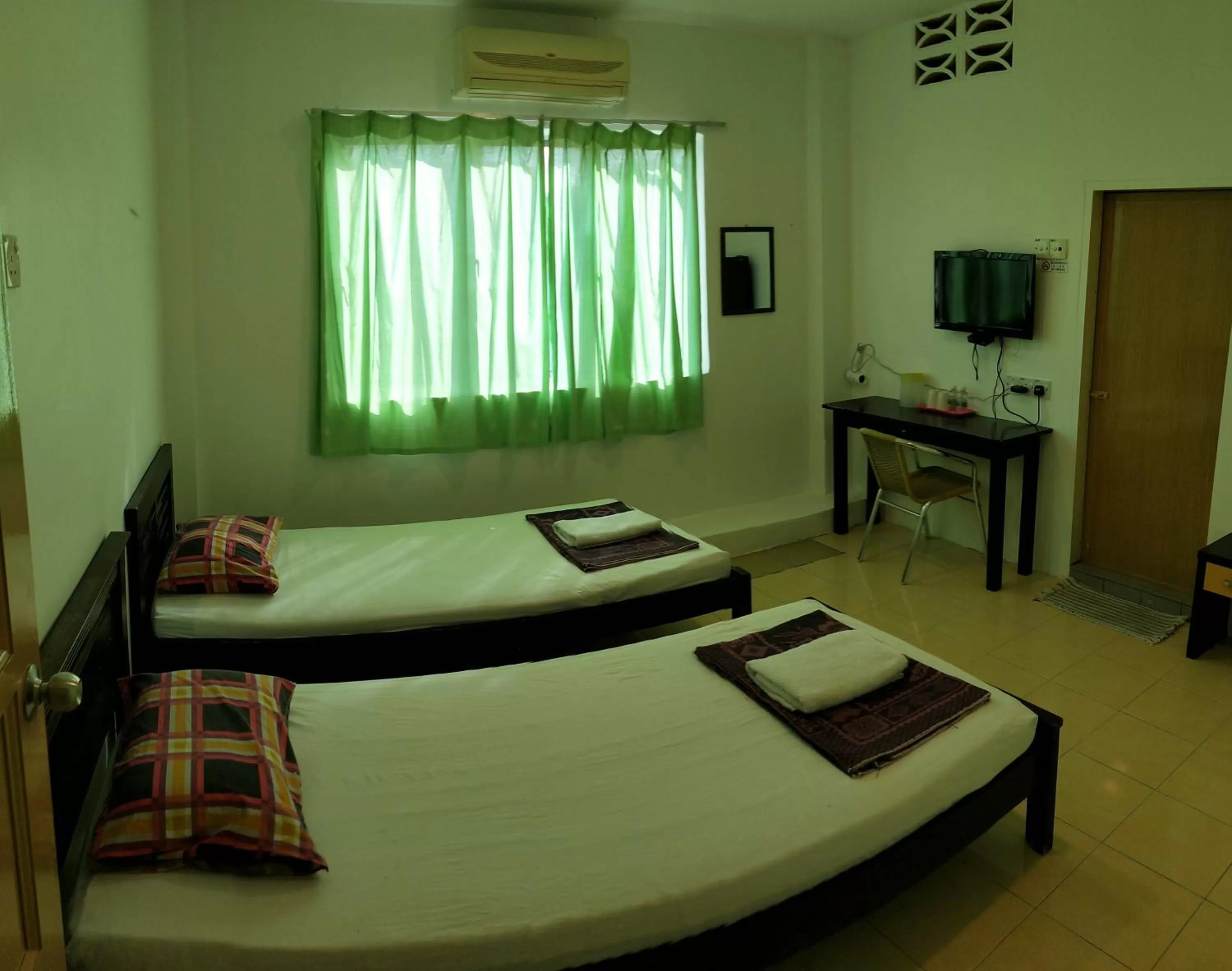 2 Single Room in Hotel Tanjong