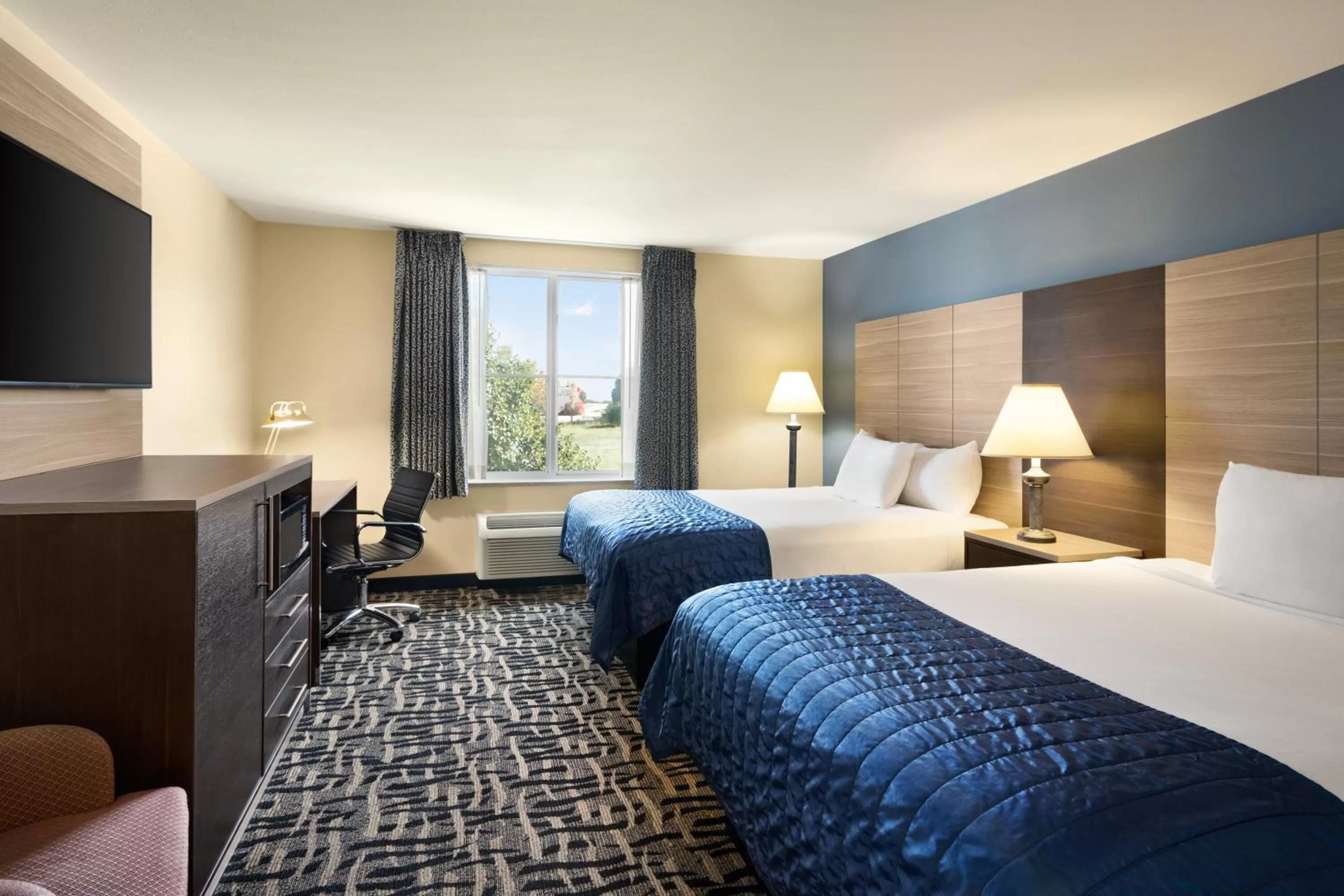 Queen Room with Two Queen Beds - Non-Smoking in Baymont by Wyndham Ft. Leonard/Saint Robert