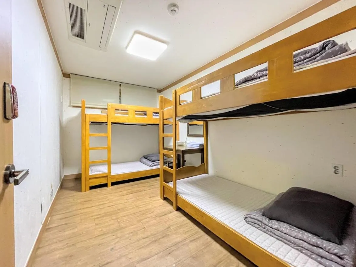 Quadruple Room with Private Bathroom in Cocoa Guesthouse