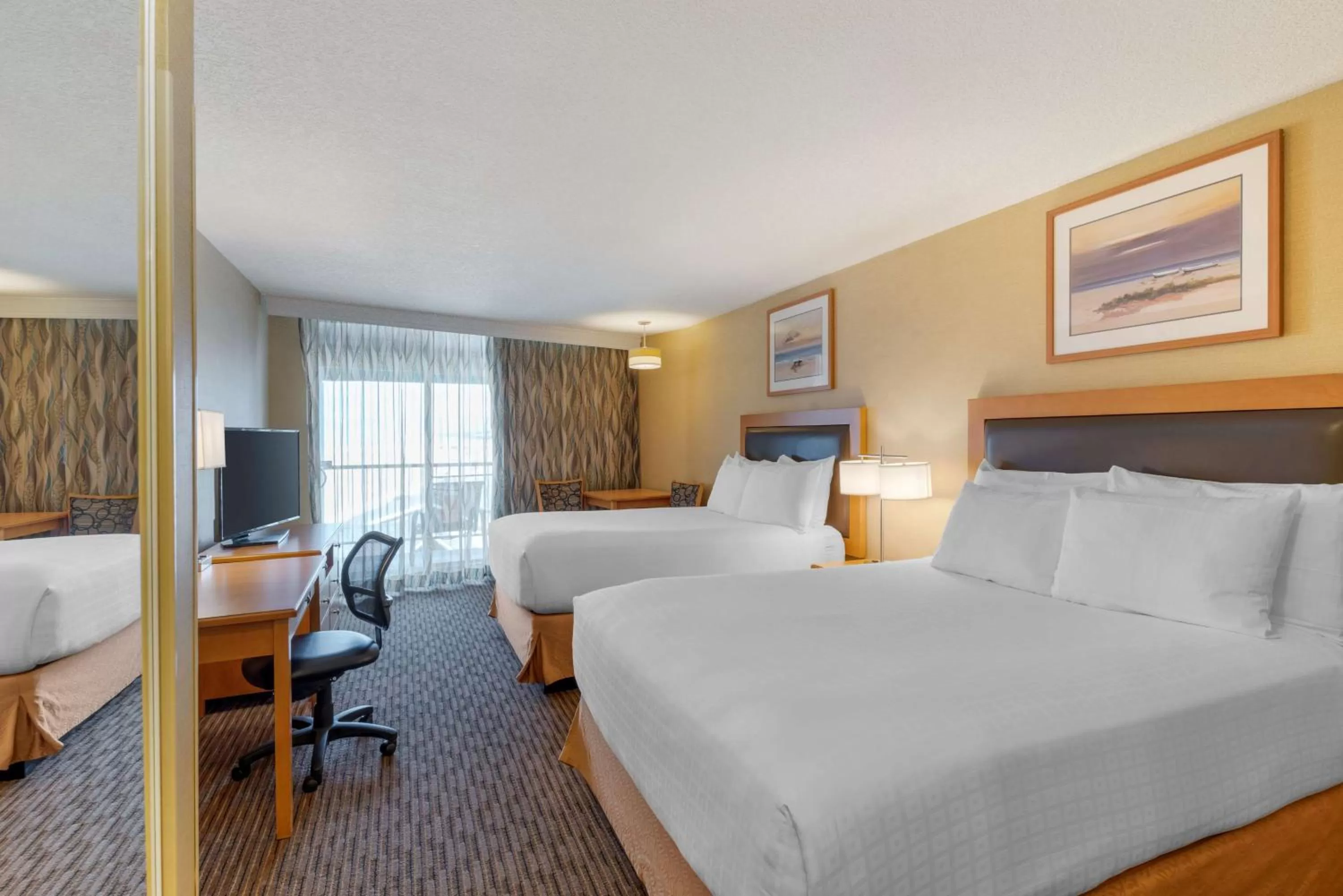 Queen Room with Two Queen Beds - Balcony and Partial View in Best Western Plus Ocean View Resort