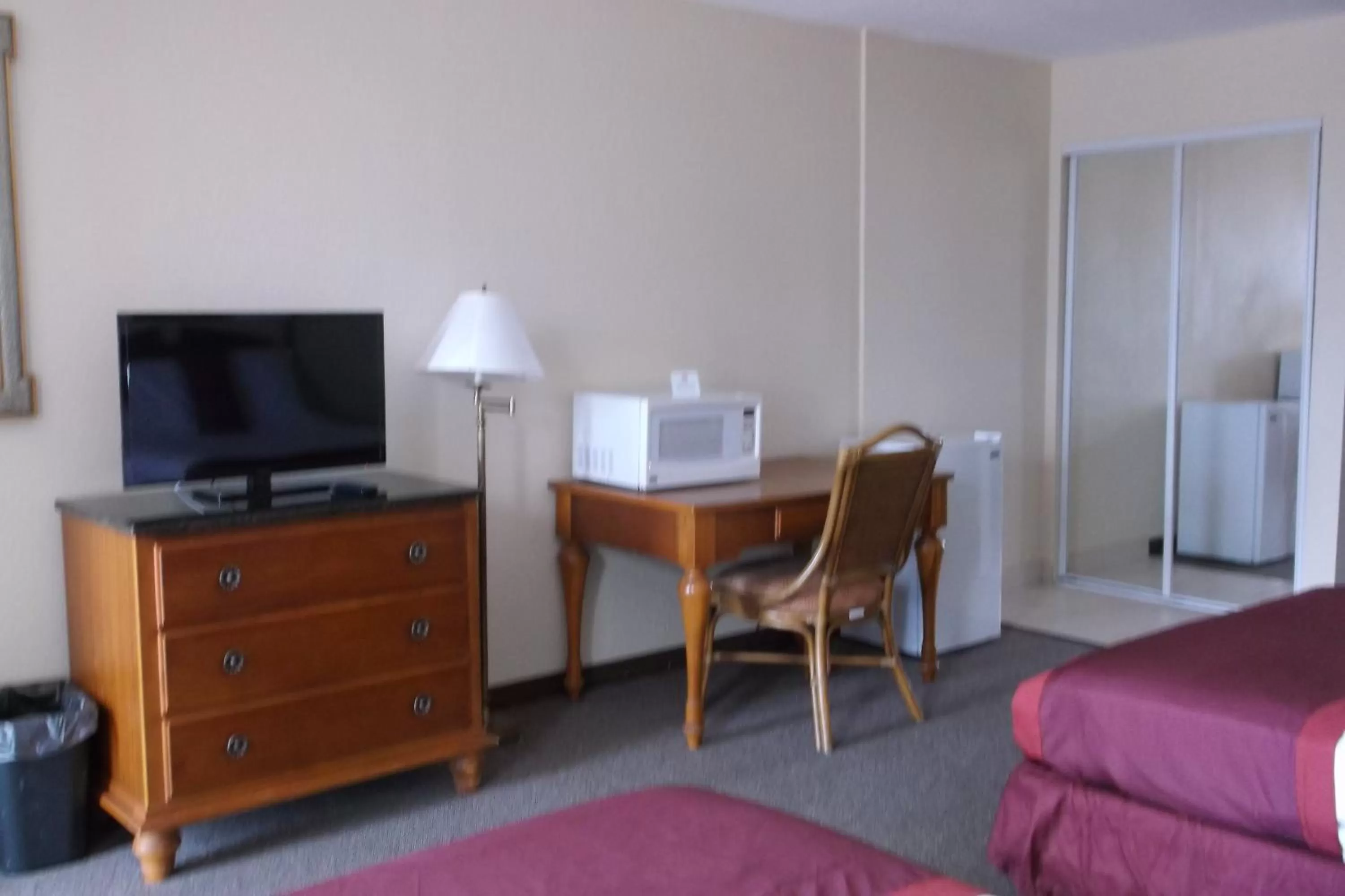 Room with One Queen and One Double Bed - Mobility Access/Non-Smoking in Days Inn & Suites by Wyndham Lake Okeechobee