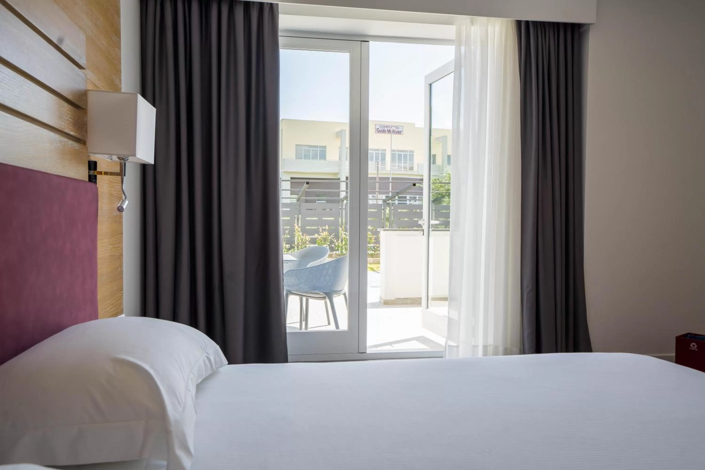 Deluxe Double Room with Balcony in PM Hotel