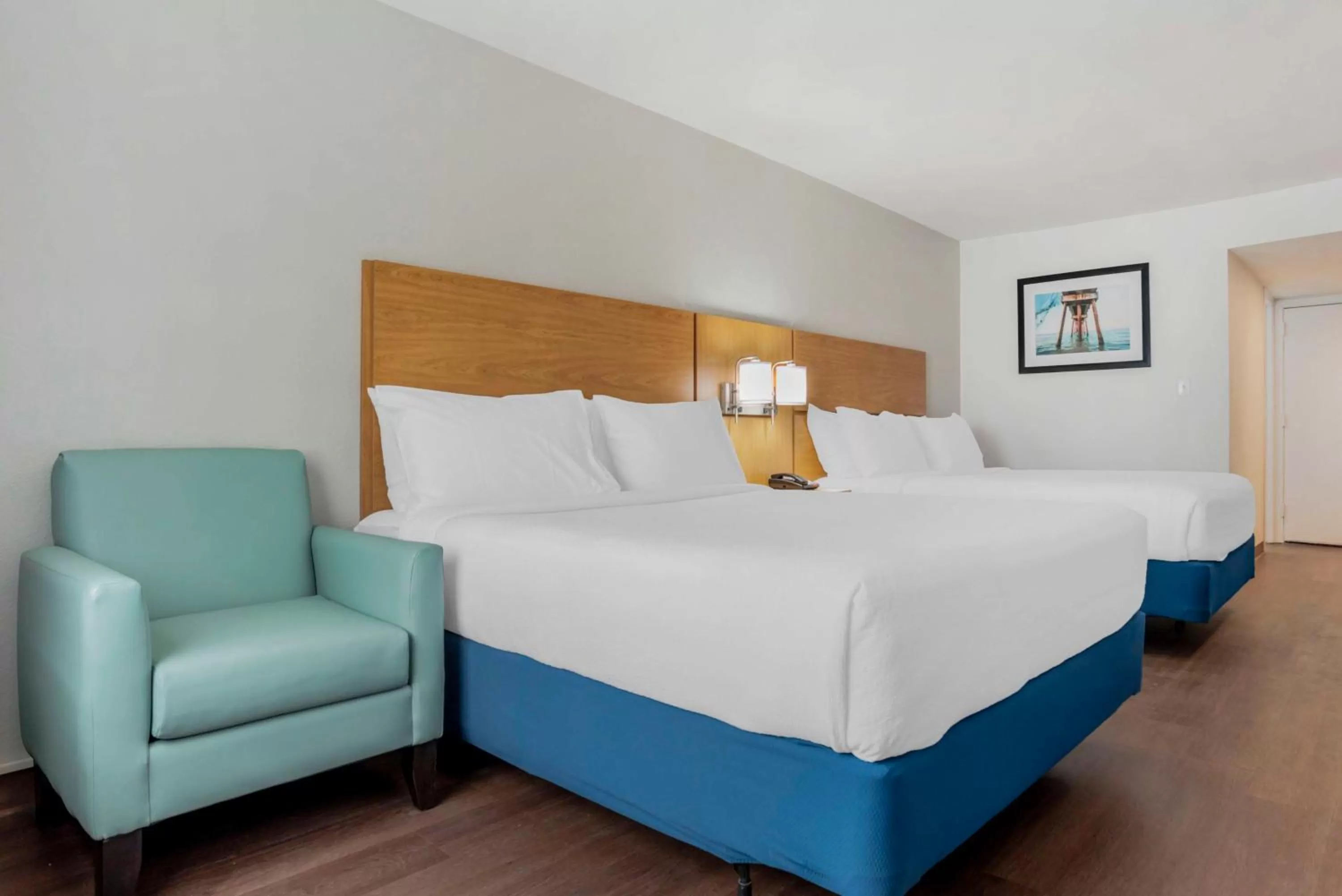 Queen Room with Two Queen Beds and Kitchenette - Non-Smoking in Chateau Beachfront Hotel, a By the Sea Resort