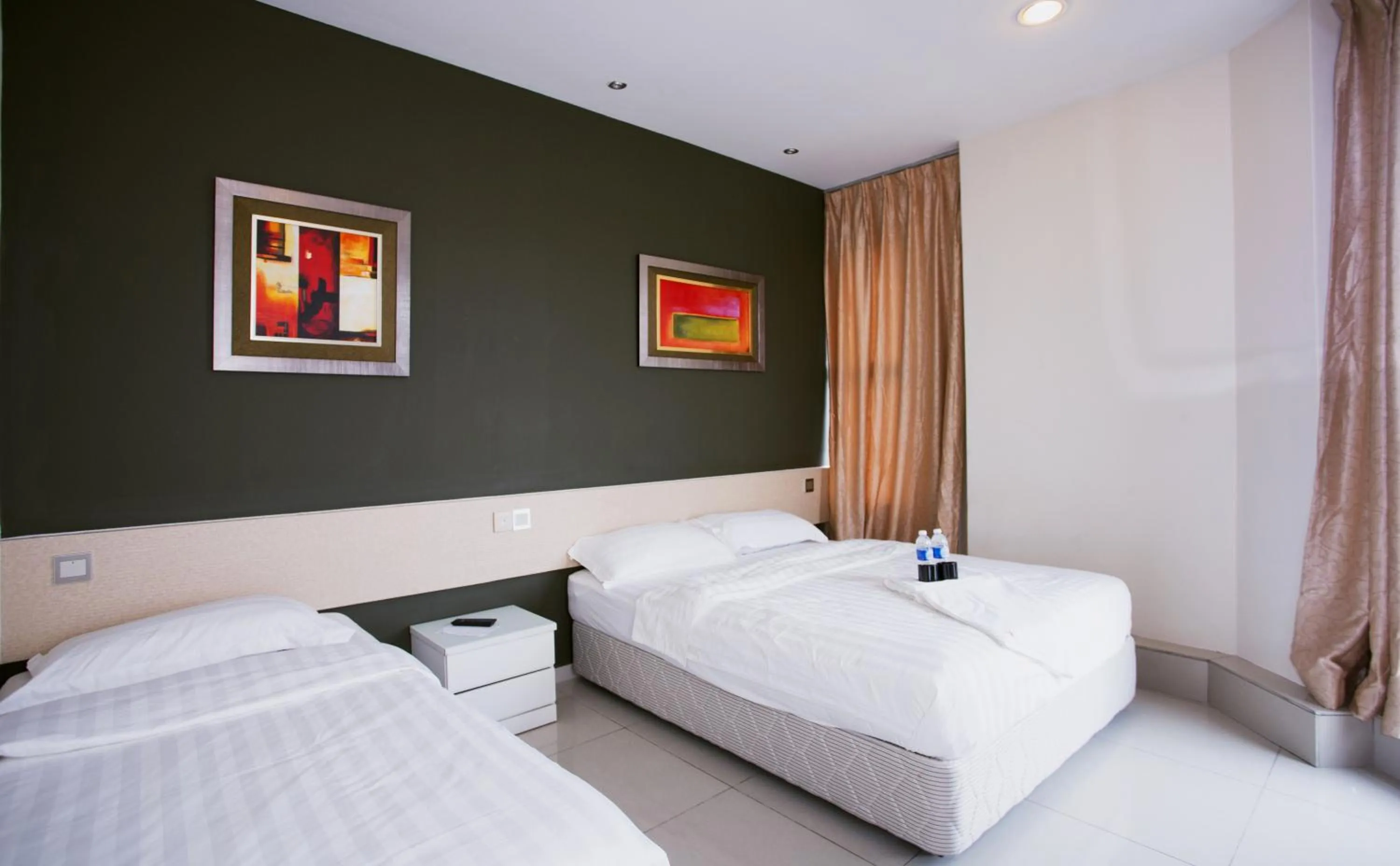 Deluxe Family Room in One Avenue Hotel