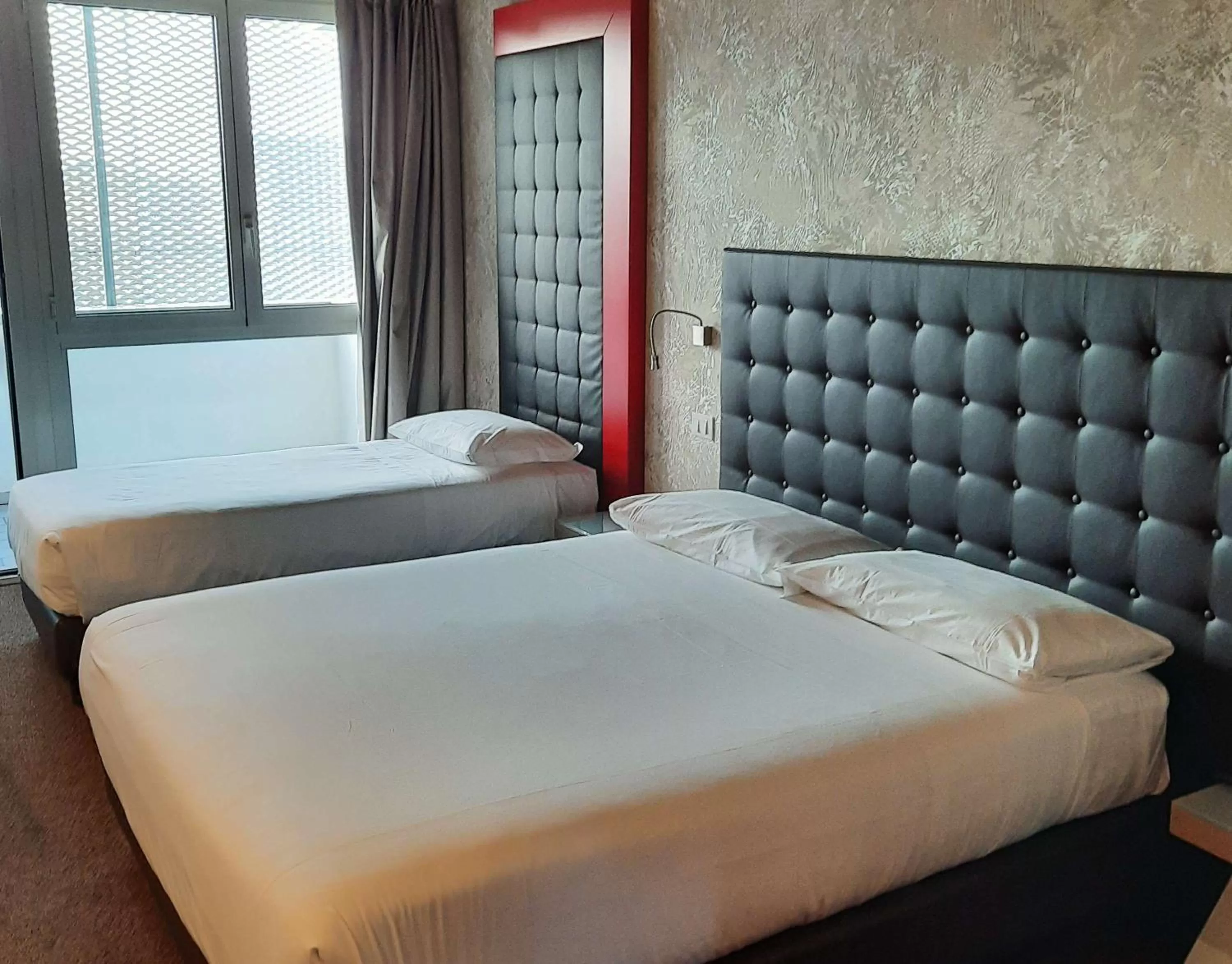 Small Triple Room in Best Western Hotel Continental