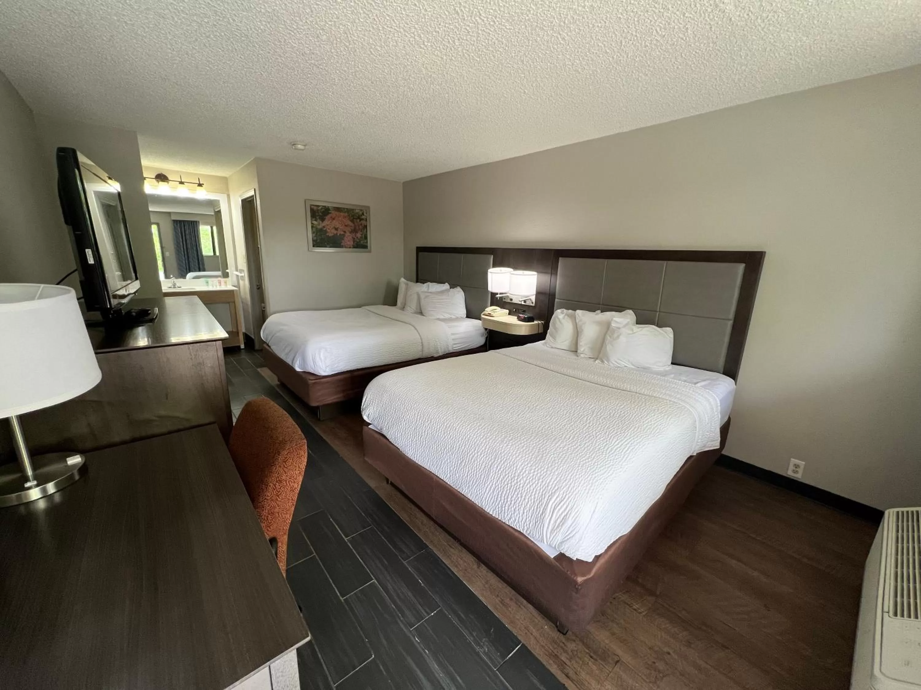 Queen Room with Two Queen Beds - Non-Smoking in Days Inn & Suites by Wyndham Monroe