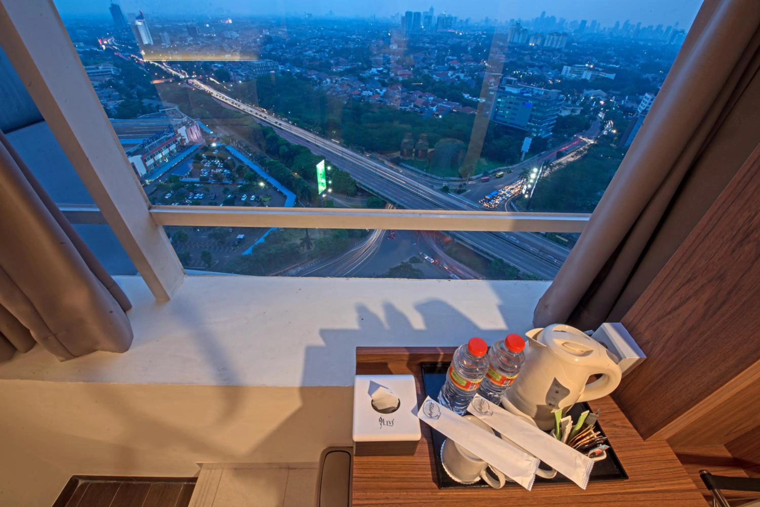 Deluxe Double Room in Grand Whiz Poins Square Simatupang