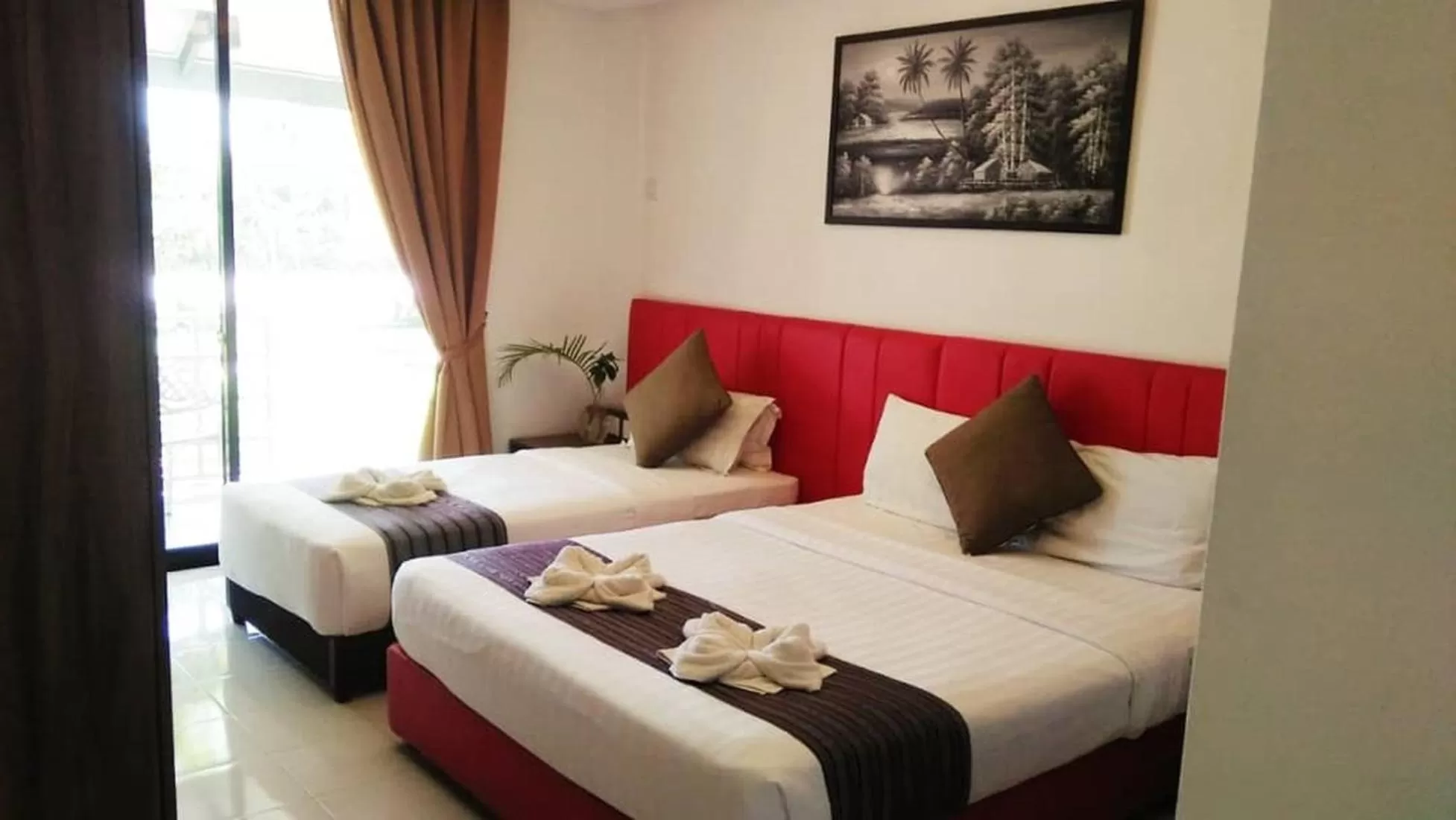 Deluxe Triple Room in Alia Residence Business Resort