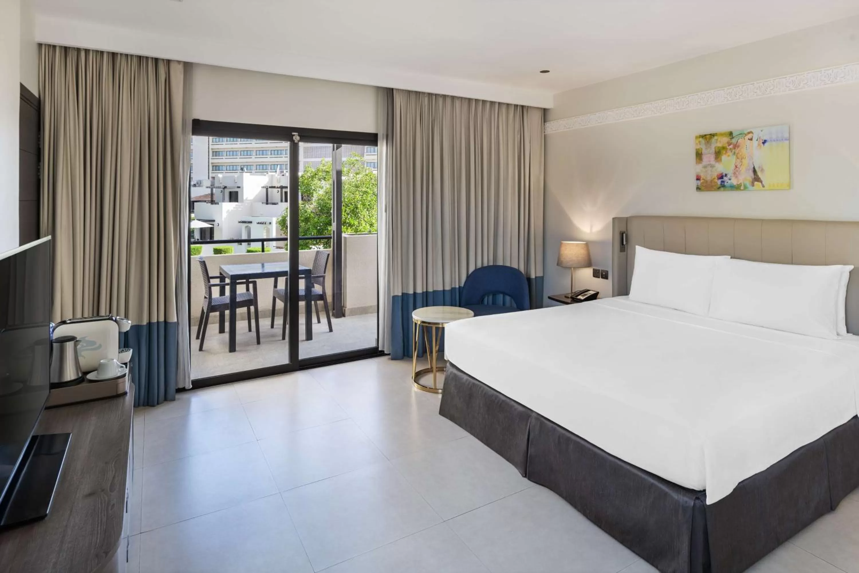 Premium Room with Balcony and Garden View - complimentary access to Cobra Waterslide in Radisson Blu Hotel & Resort, Al Ain