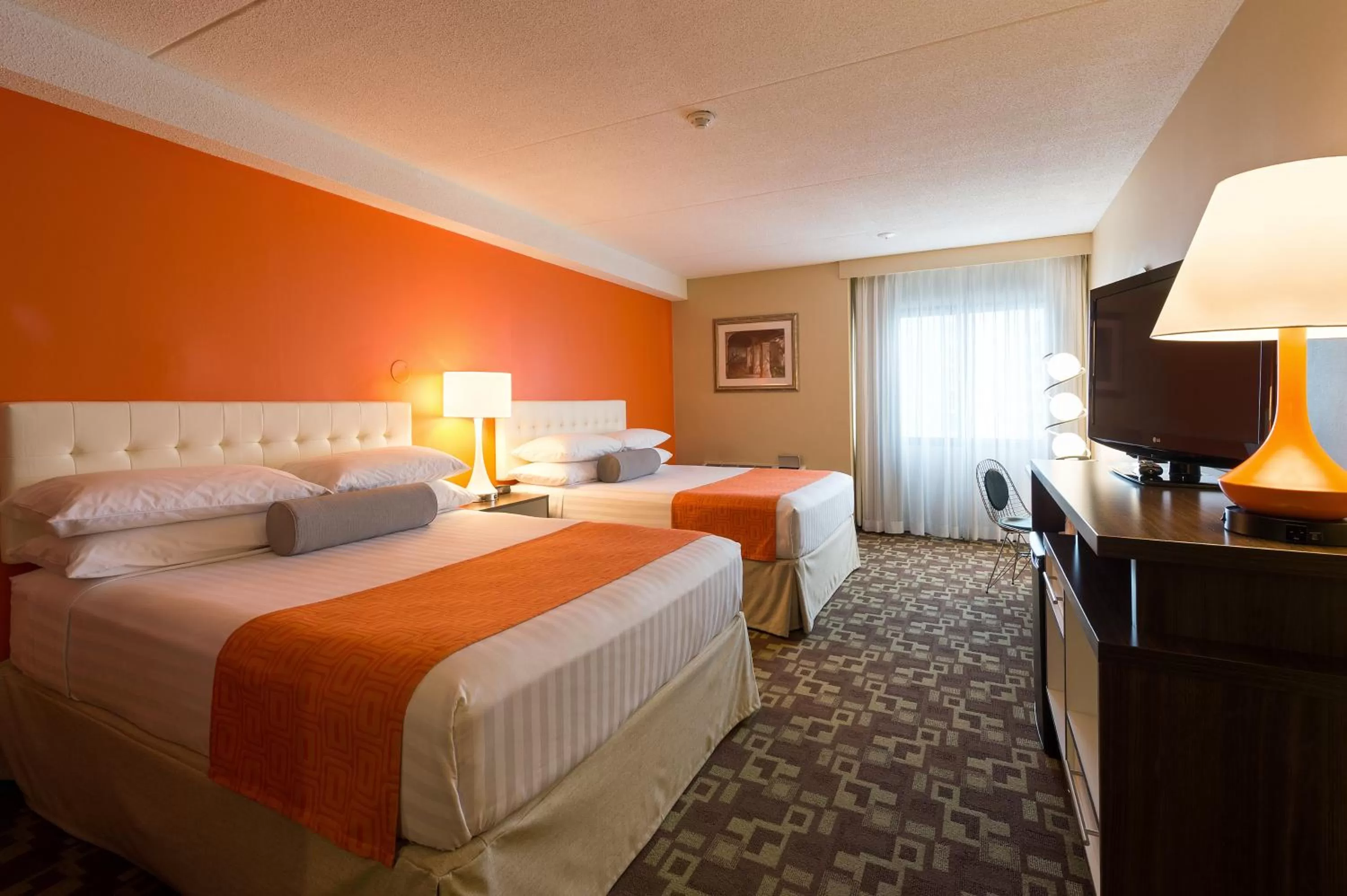 Family Suite with Three Queen Beds - Non-Smoking in Howard Johnson Plaza by Wyndham by the Falls Niagara Falls