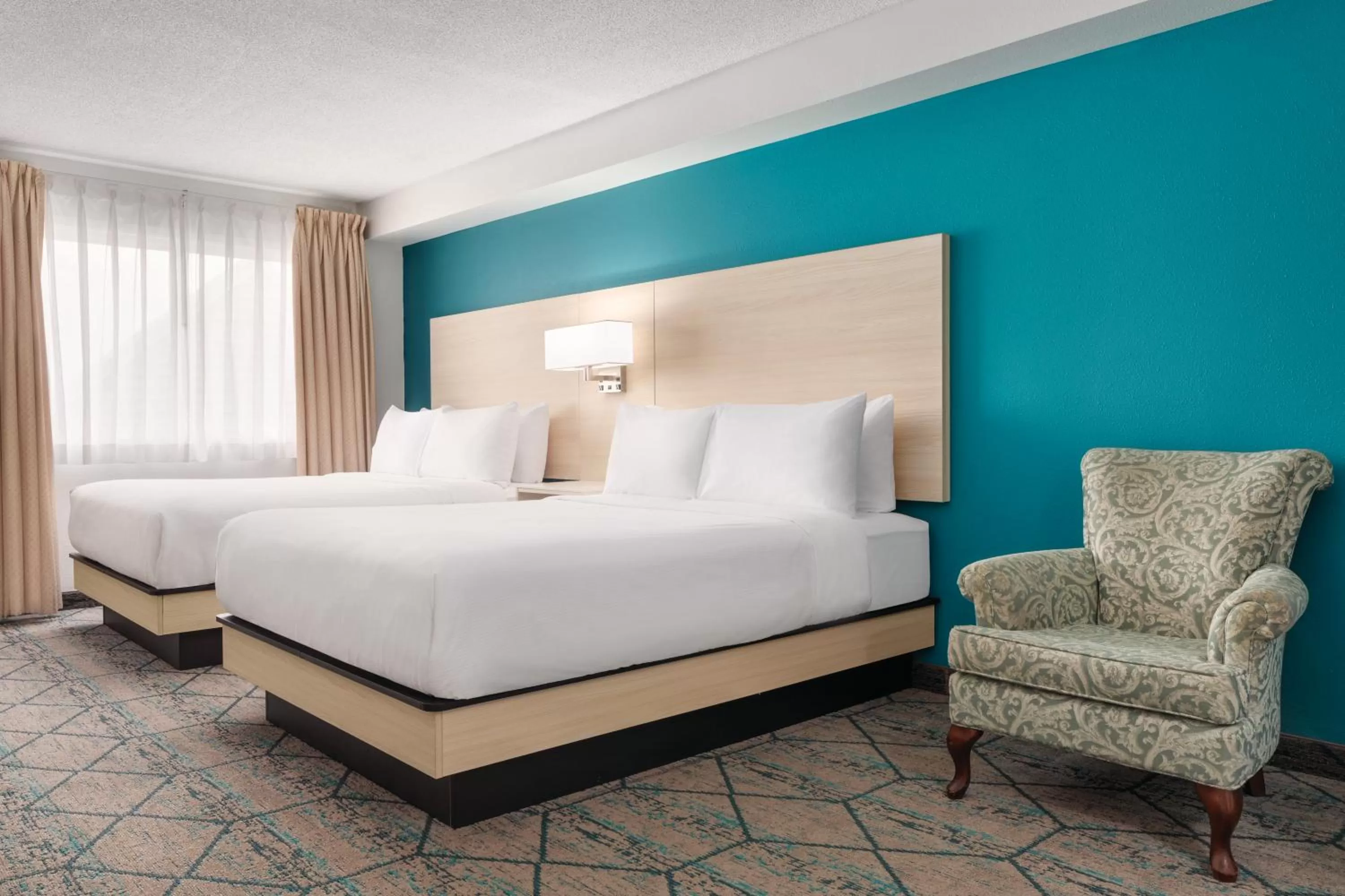 Queen Room with Two Queen Beds - First Floor/Non-Smoking in Ramada by Wyndham Miramichi New Brunswick