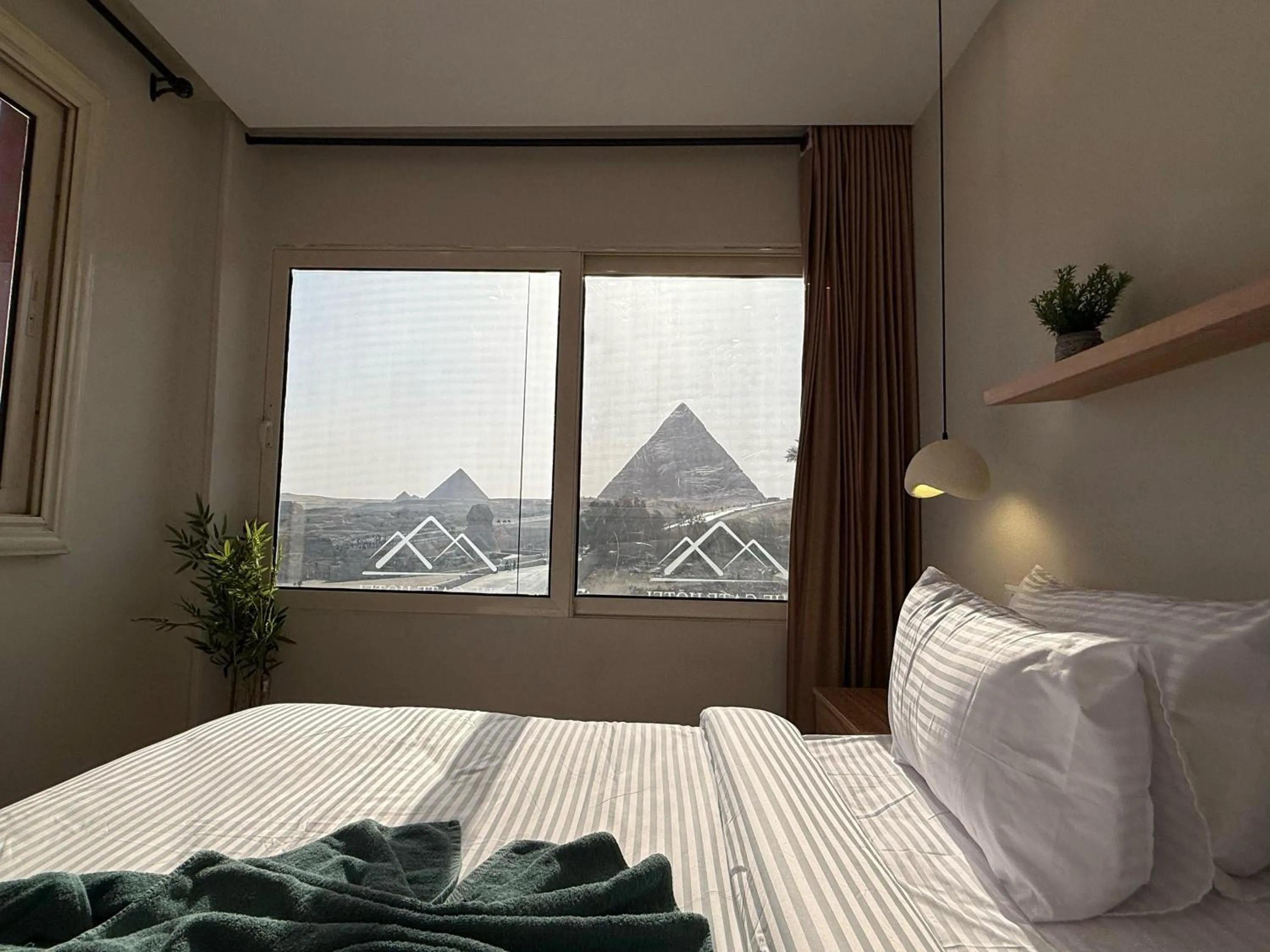 Premium King Room Pyramids View in The Gate Hotel Front Pyramids & Sphinx View