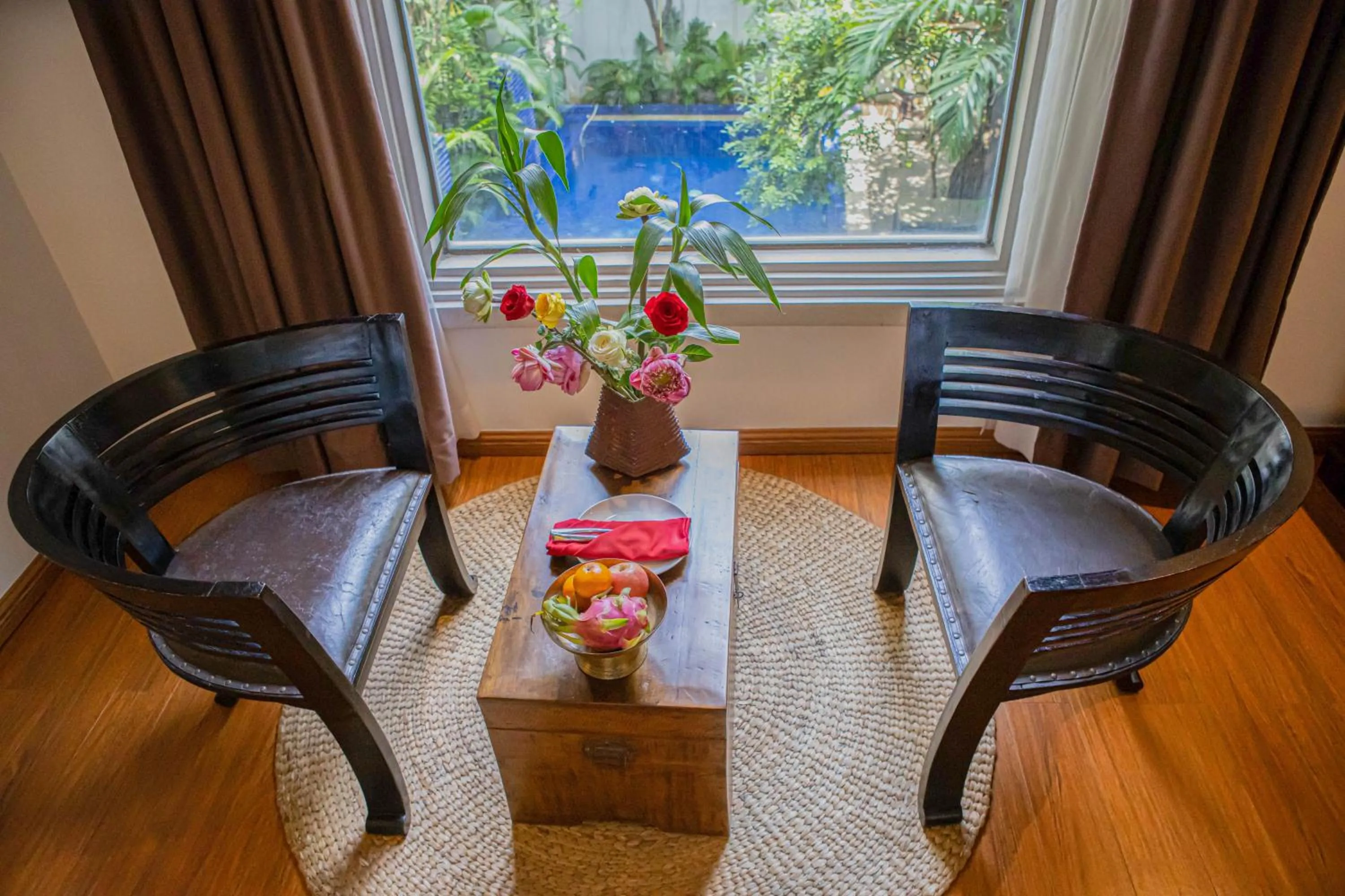 Family Suite with Pool View in La Rose Suites
