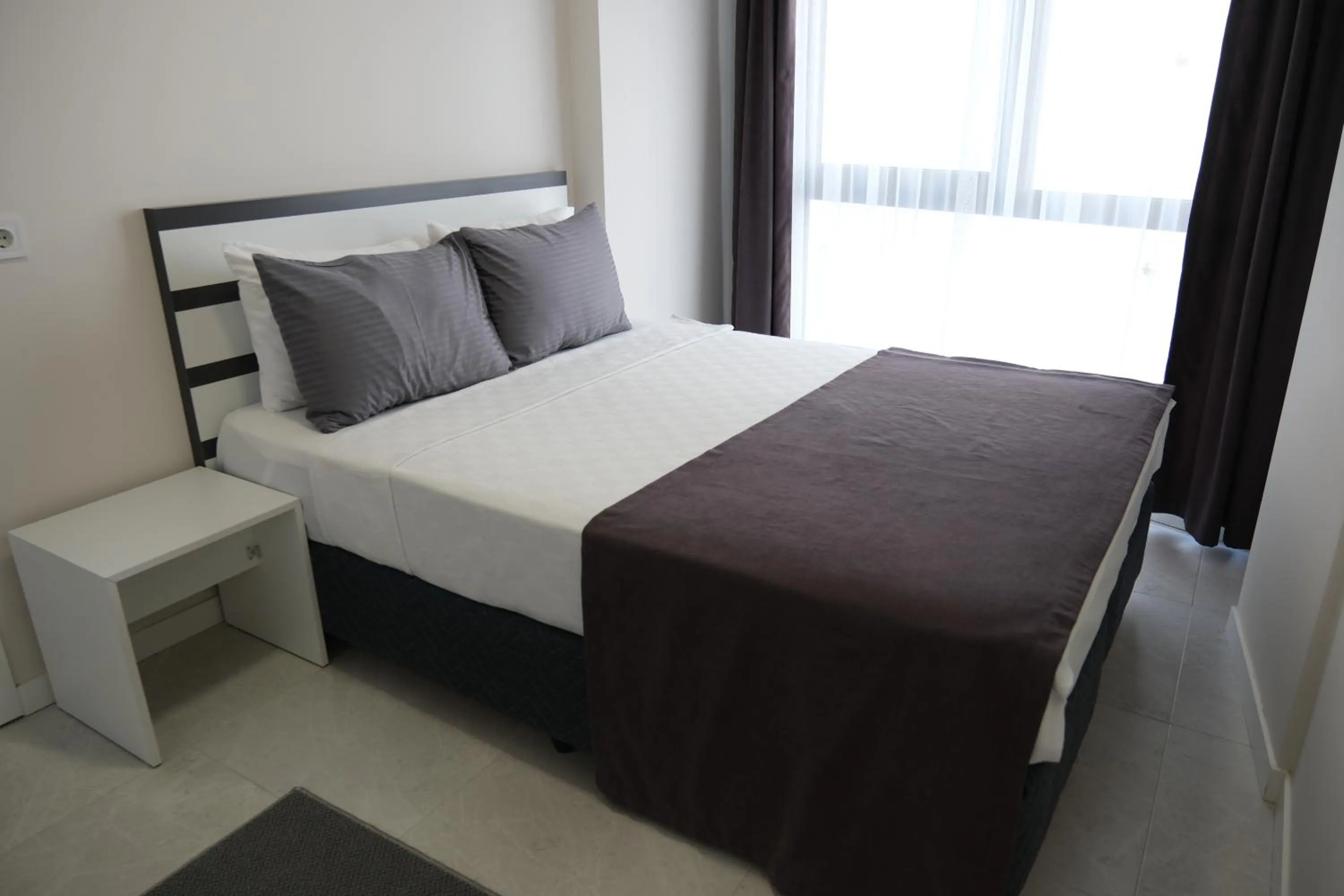 Deluxe Quadruple Room in JK Business