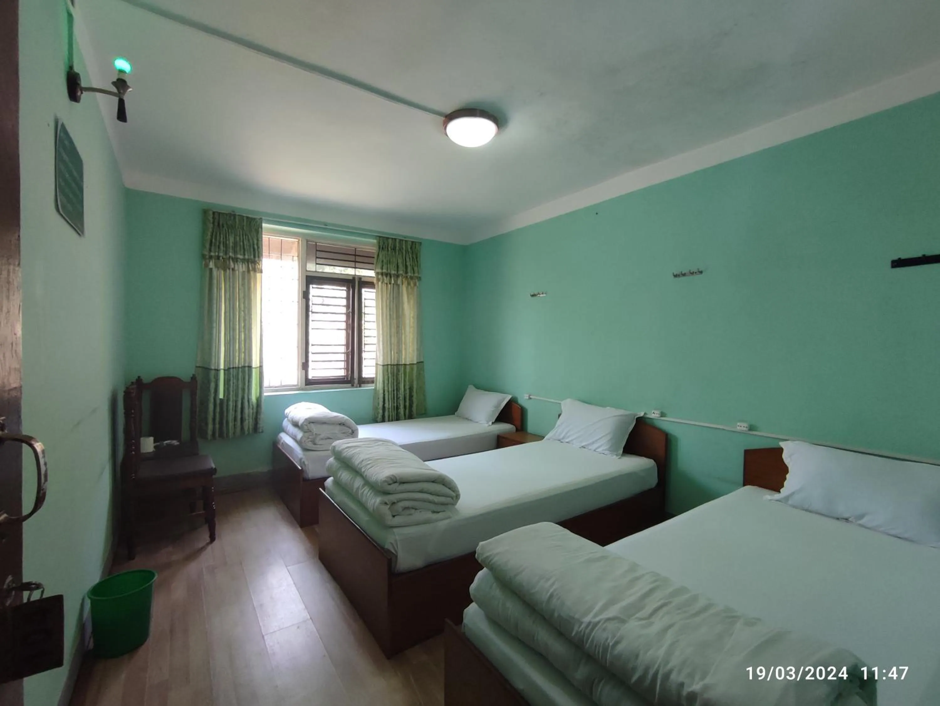 Basic Triple Room with Shared Bathroom in Hotel Mount Paradise