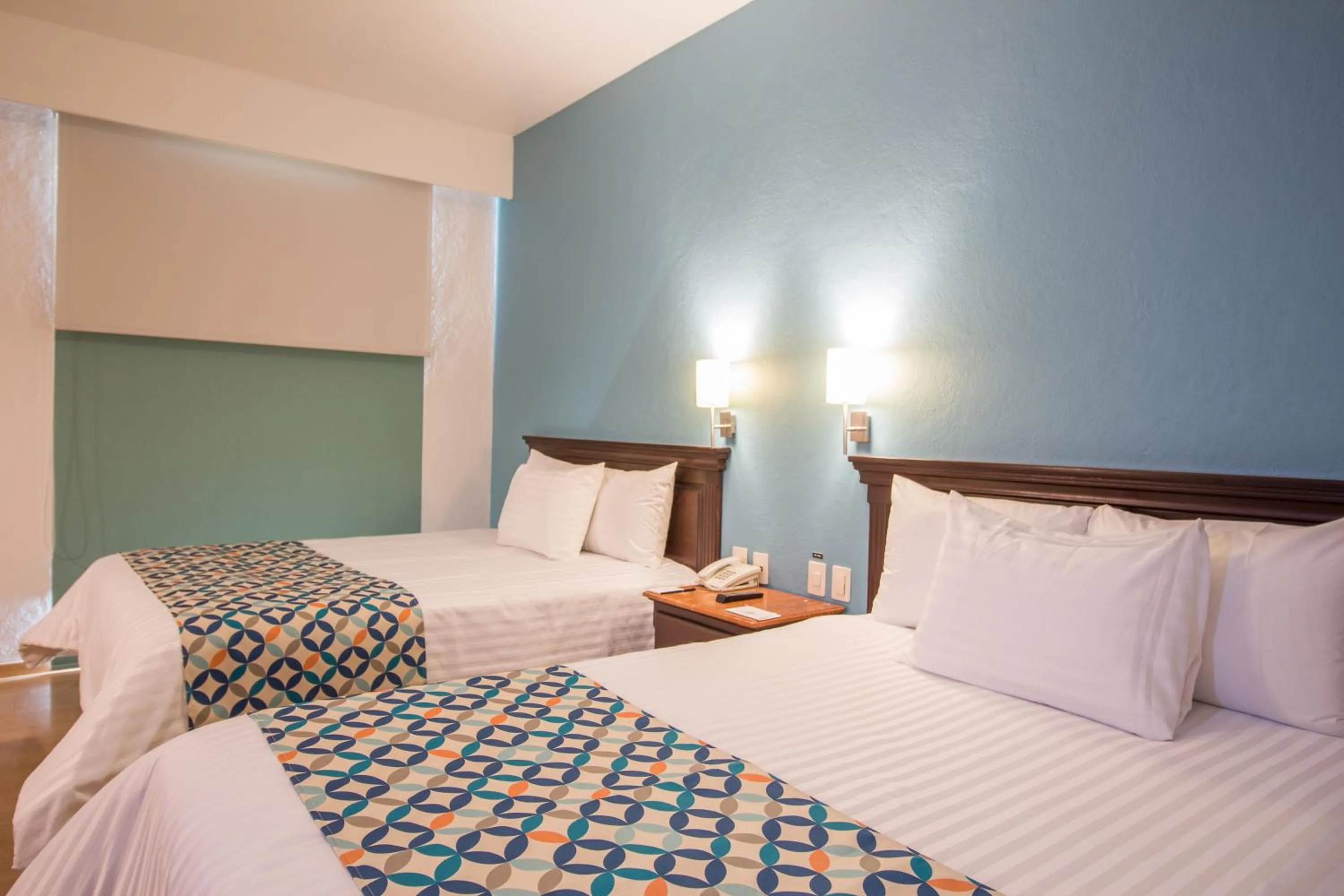 Standard Quadruple Room in HG Hotel