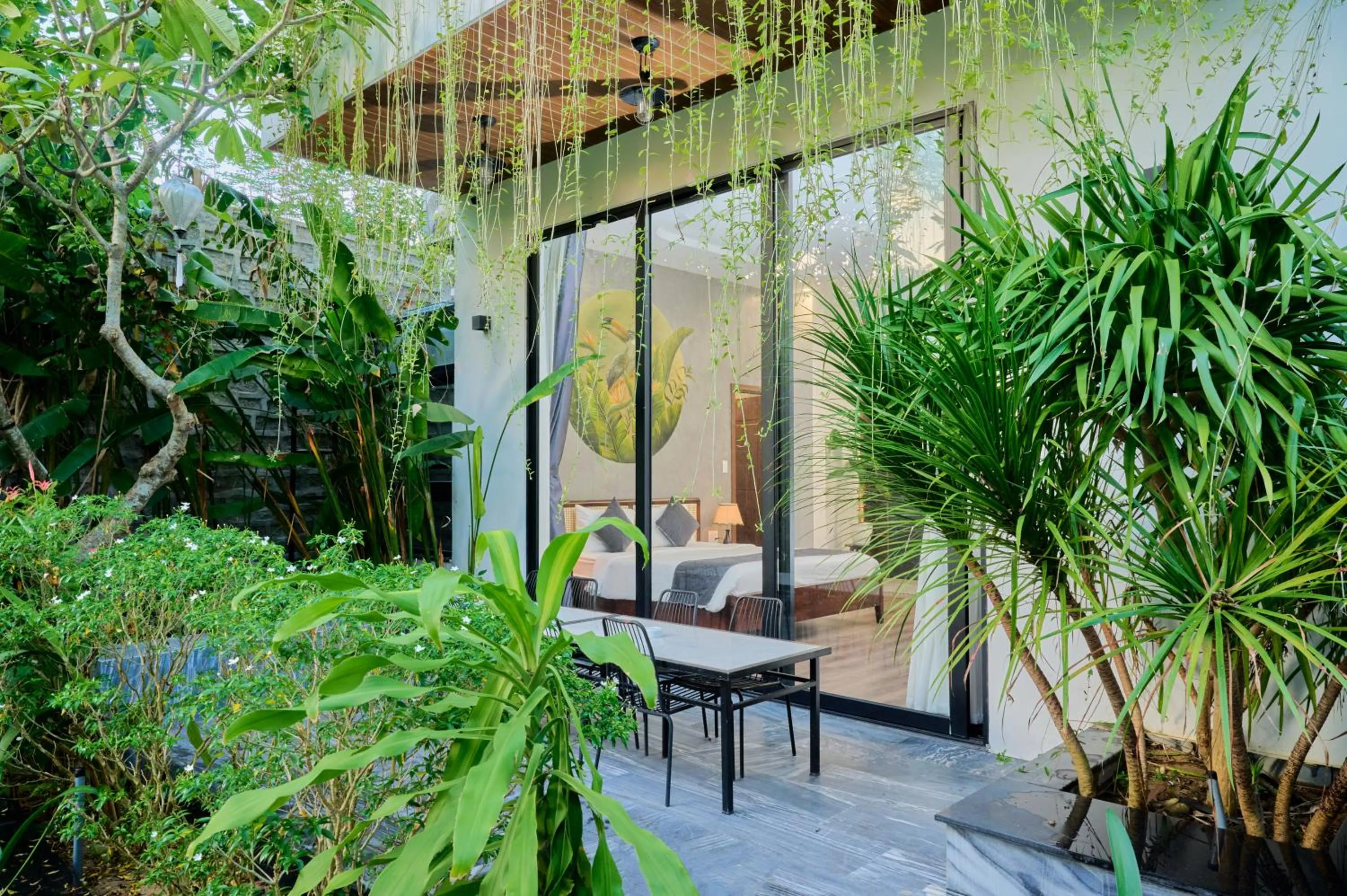 Deluxe Room (2 Adults + 1 Child) in Charm Champion Villa Hoian