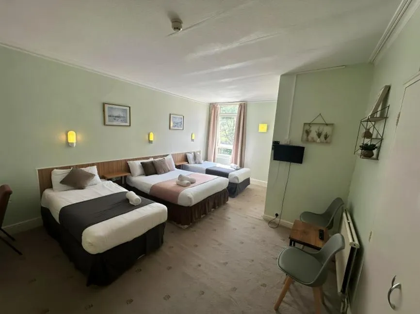 Standard Quadruple Room in Green Gables Hotel