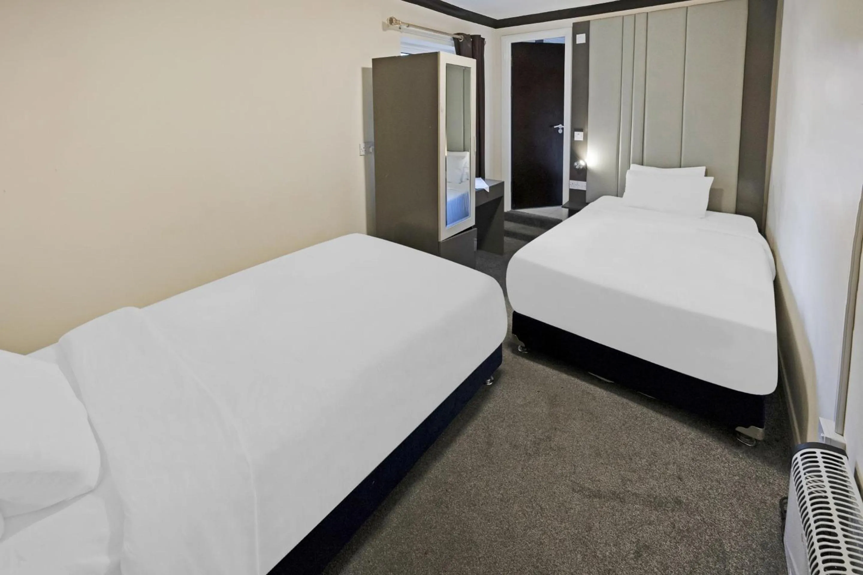 Standard Twin Room in OYO The Baltimore Hotel
