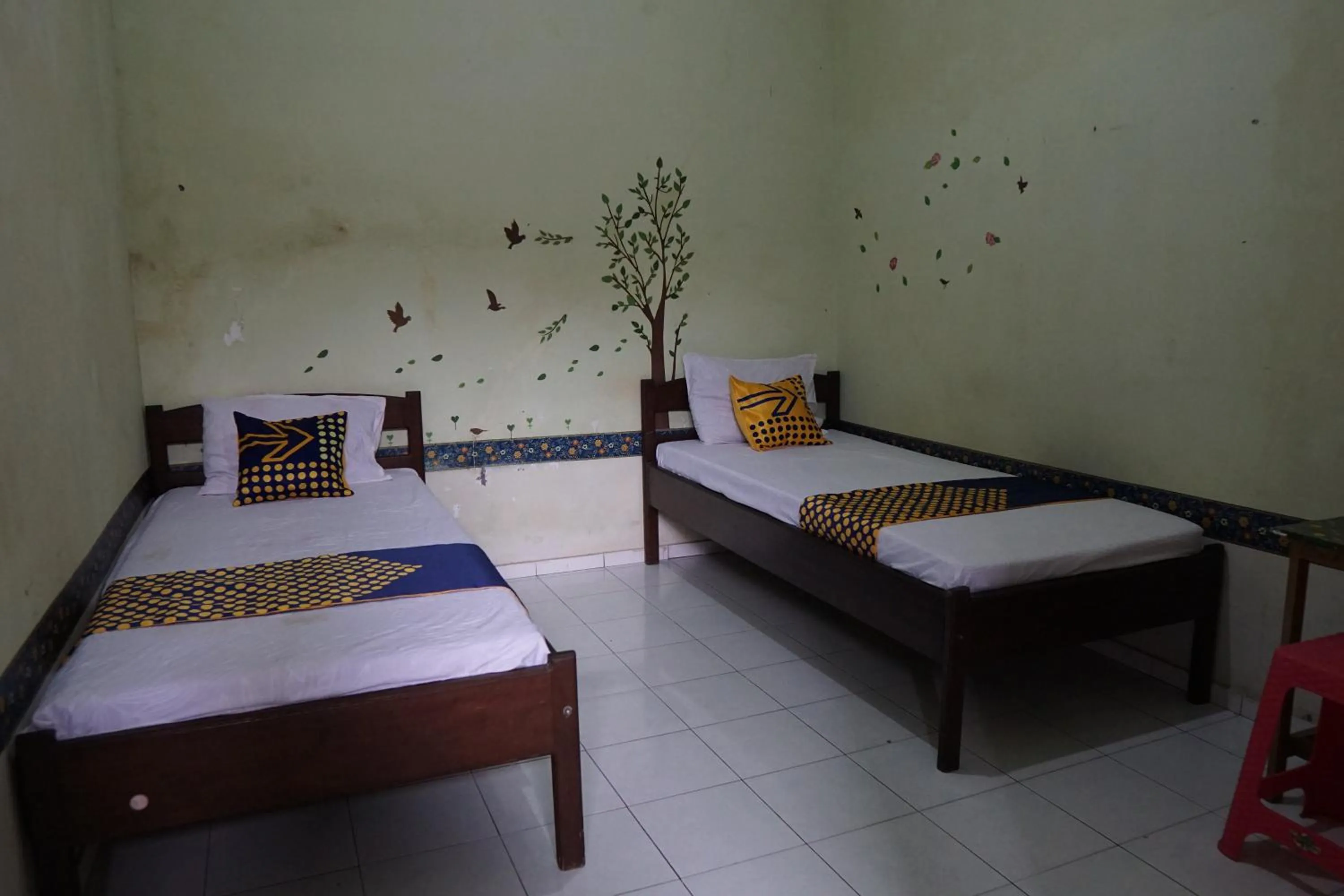 Economy Twin Room in Hotel O Yoko Kost Syariah