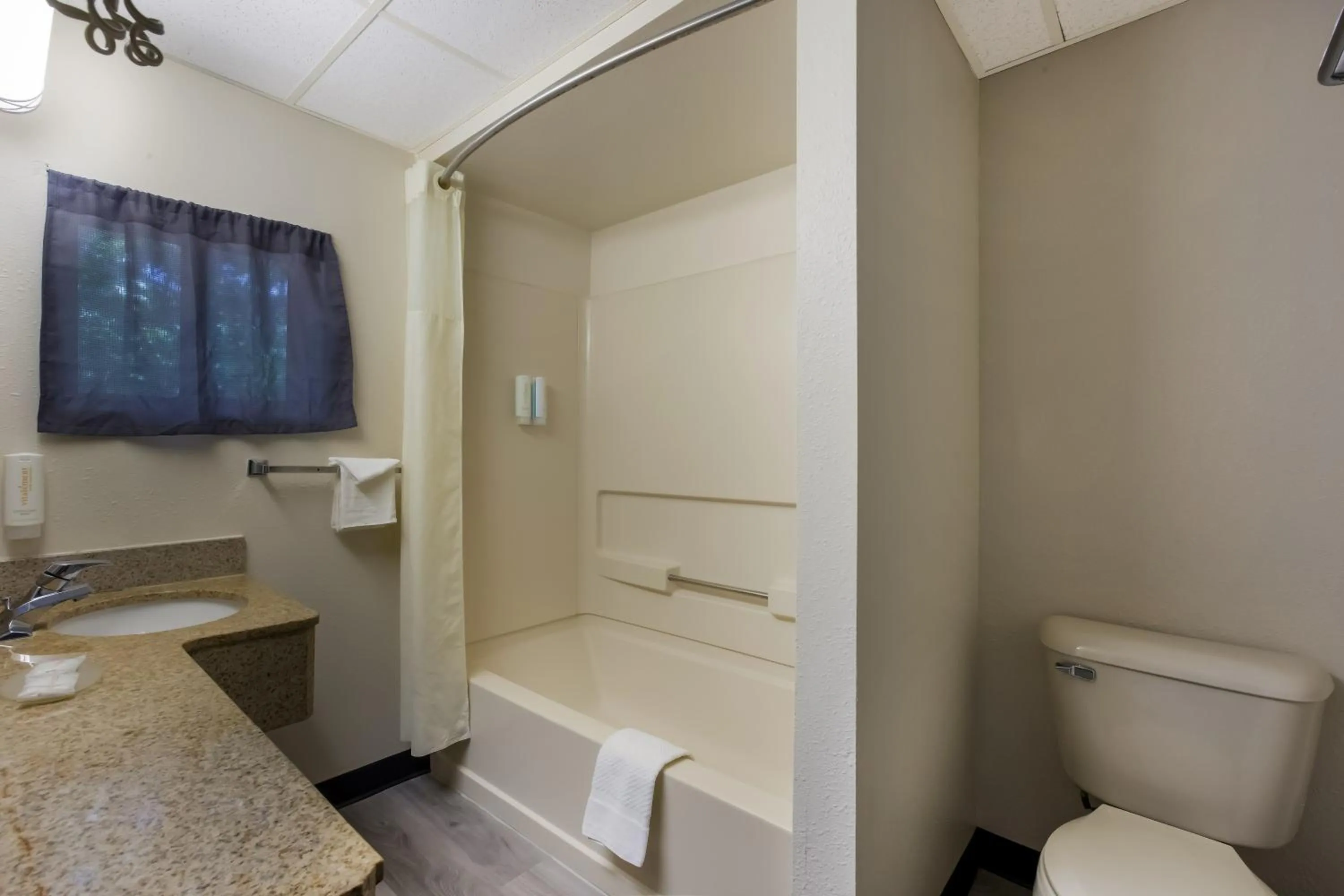 Quadruple Room with Two Queen Beds - Disability Access/Non Smoking in Suburban Studios Millville